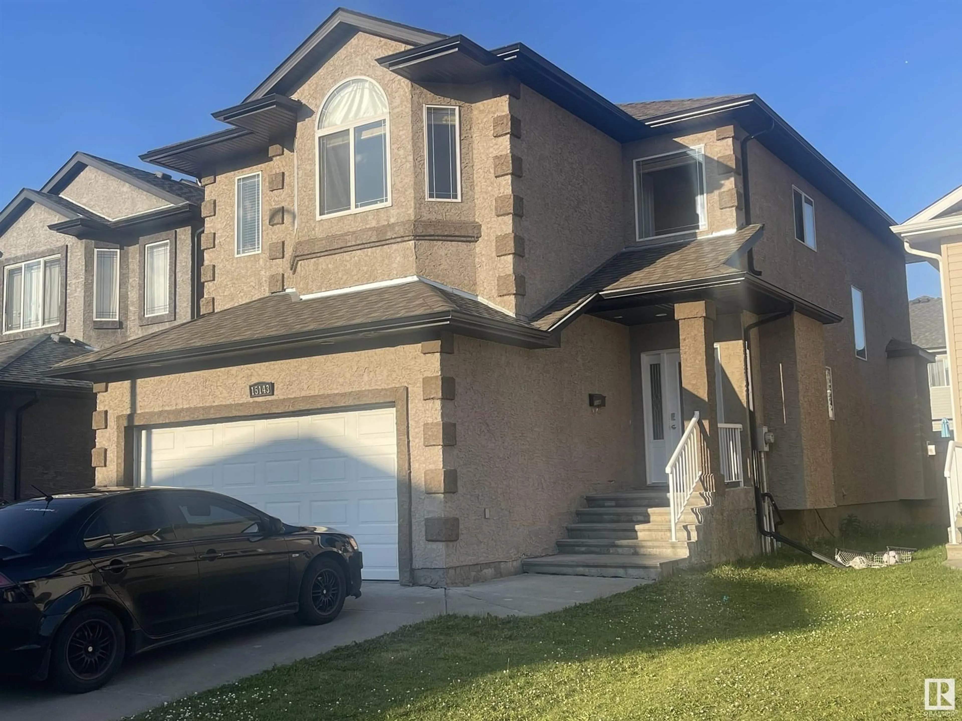 Home with vinyl exterior material, street for NW - 15143 32 ST, Edmonton Alberta T5Y0M3