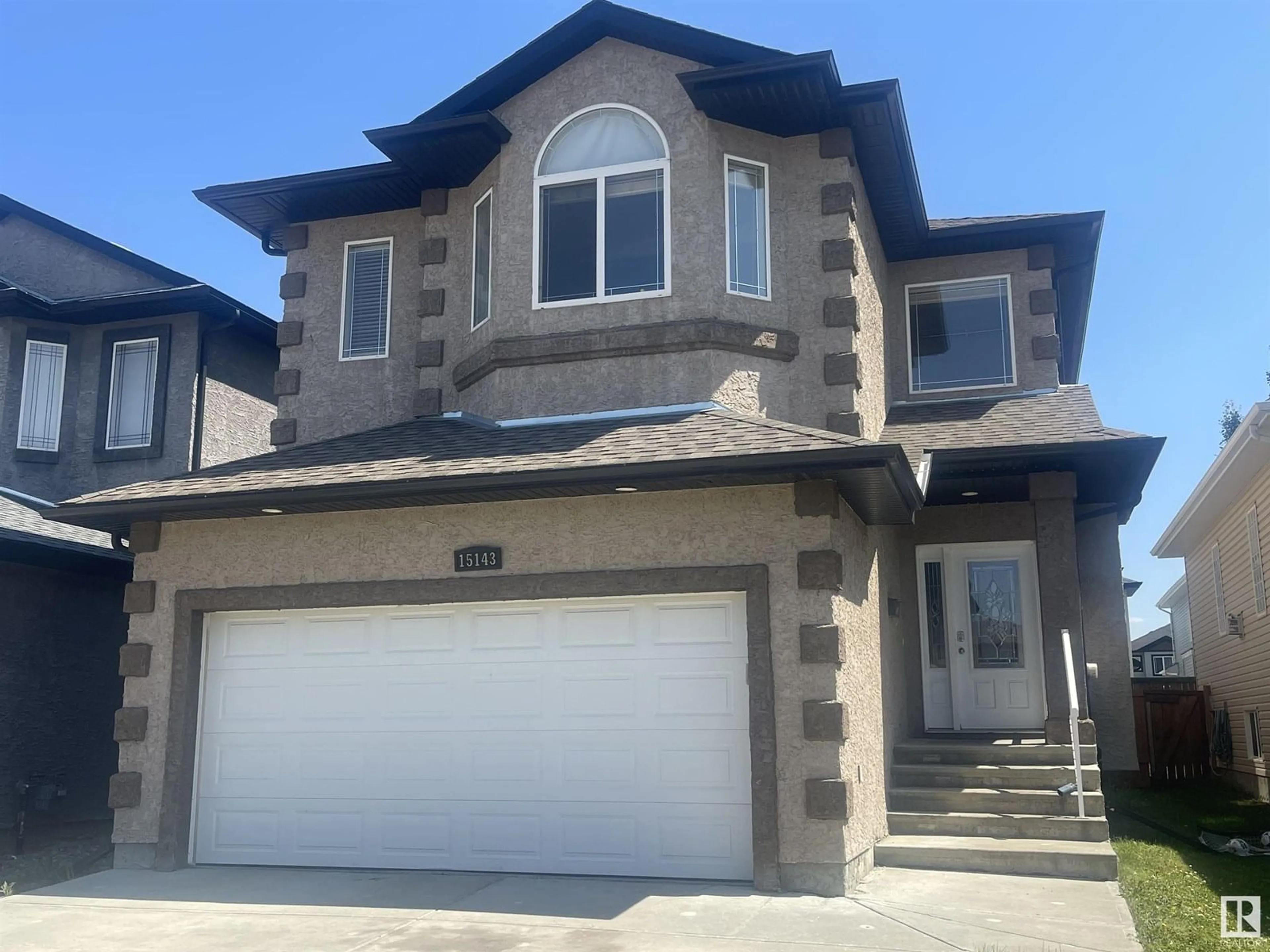 Home with vinyl exterior material, street for NW - 15143 32 ST, Edmonton Alberta T5Y0M3