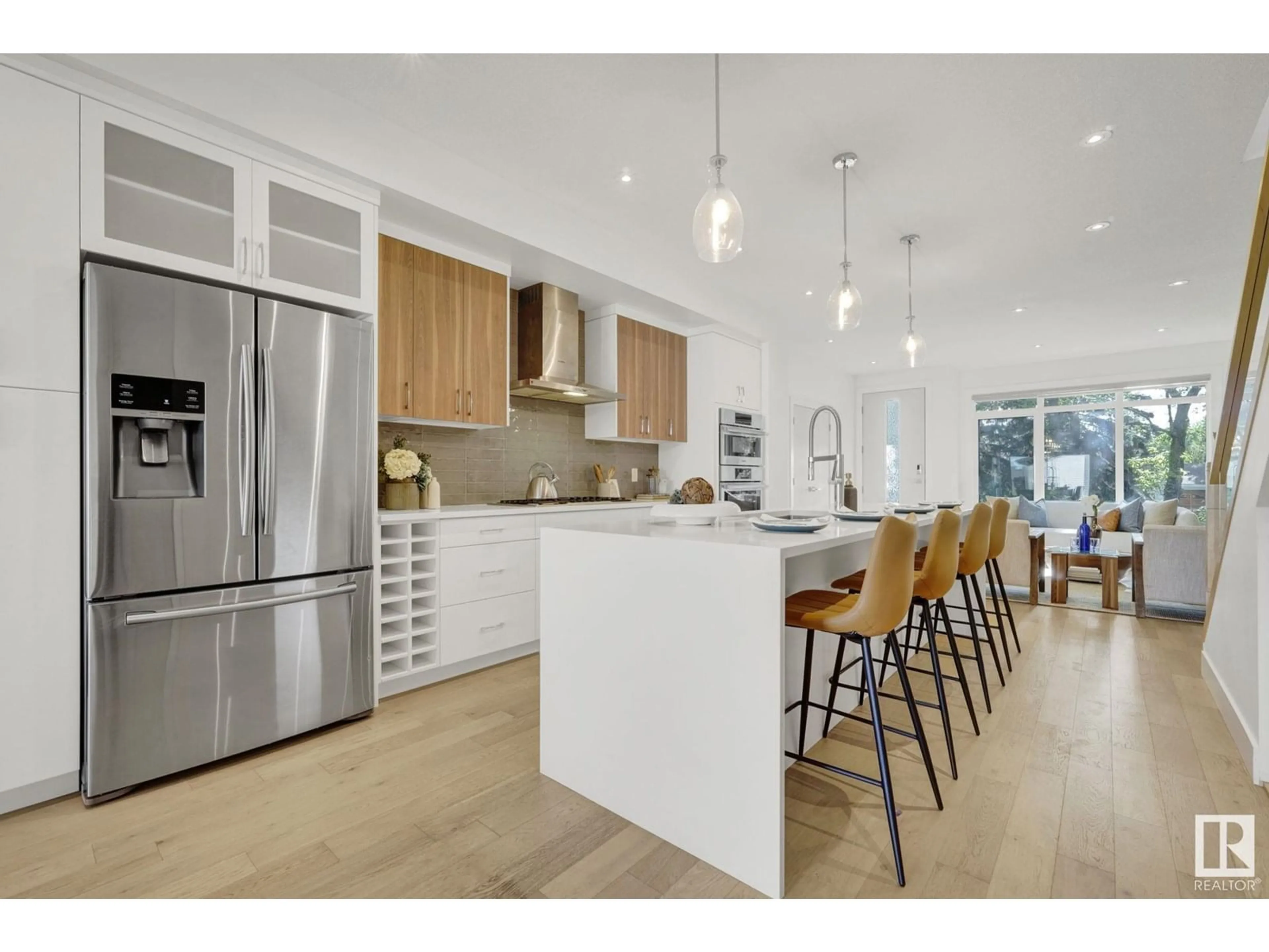 Open concept kitchen, wood/laminate floor for NW - 10966 123 ST, Edmonton Alberta T5M0E2