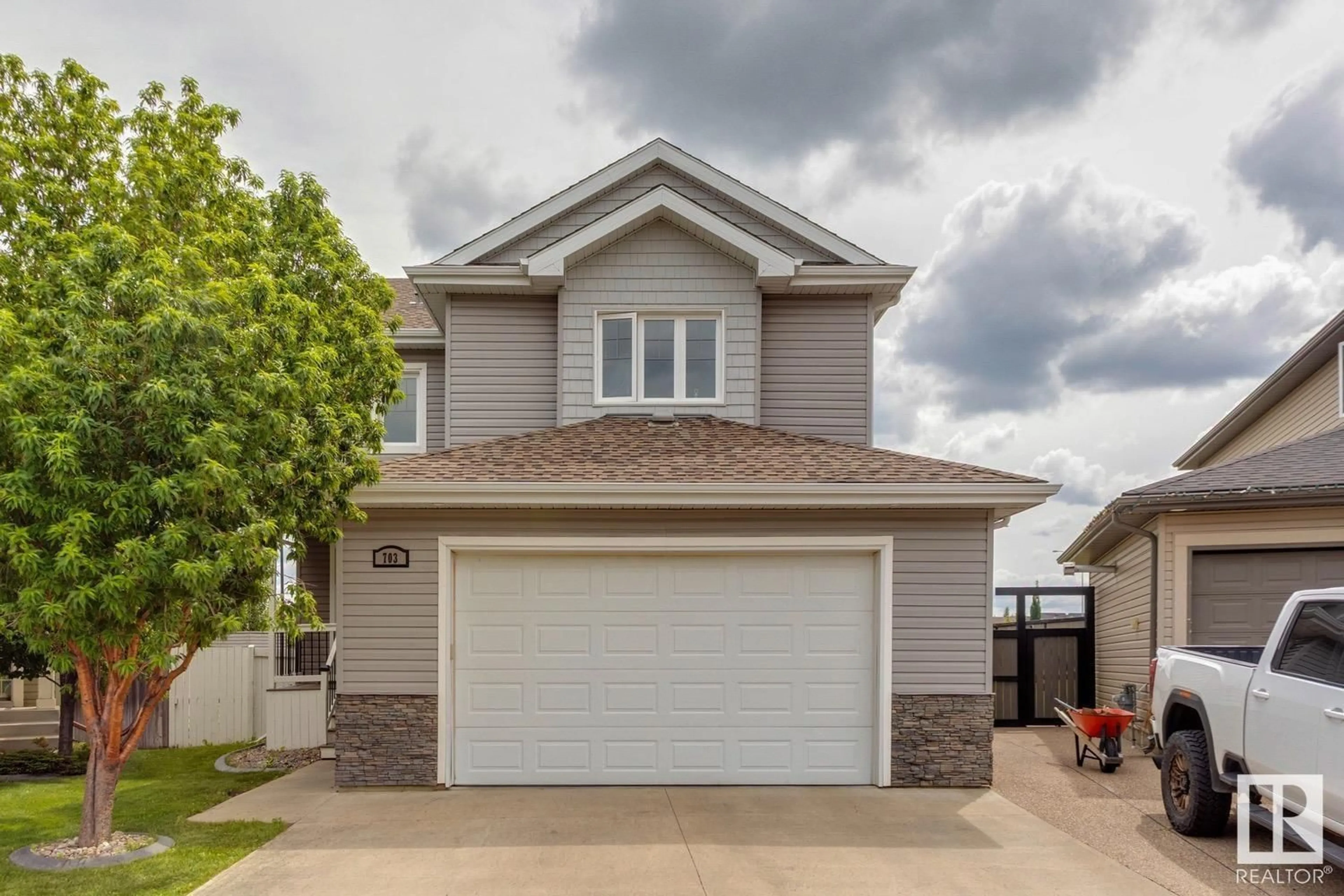 Home with vinyl exterior material, street for 703 SUNCREST POINT, Sherwood Park Alberta T8H0G6