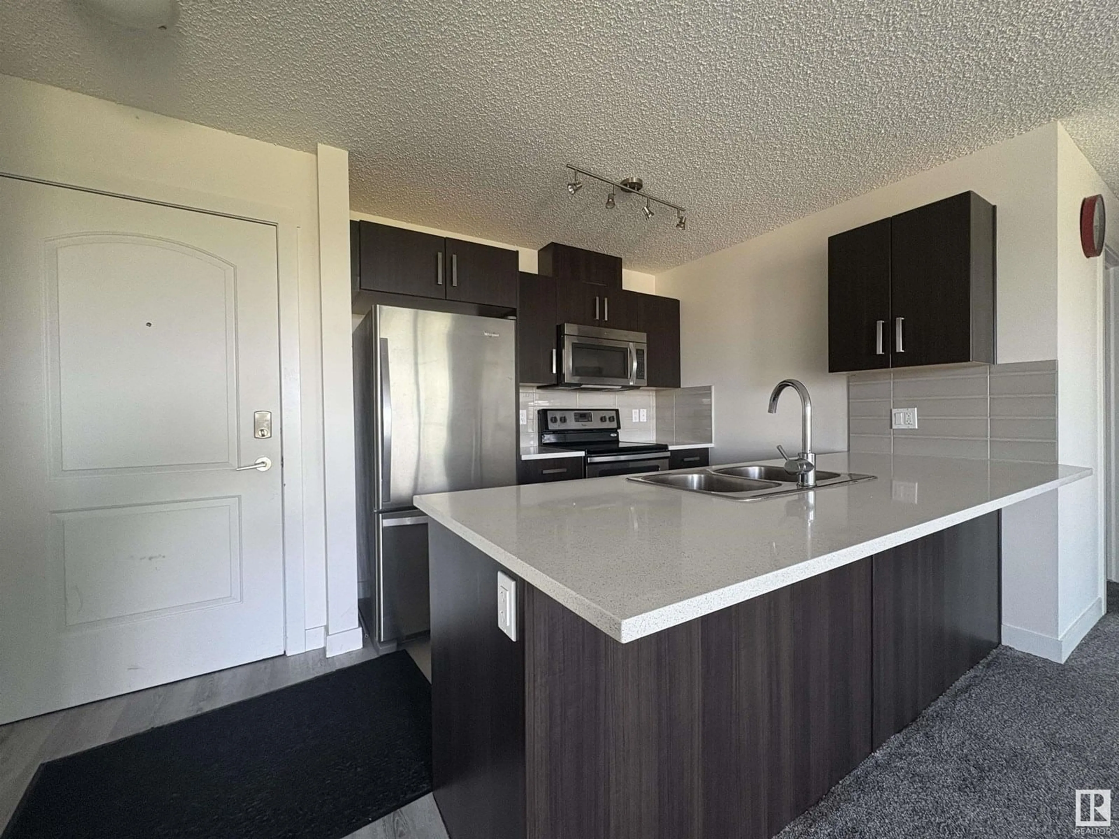 Open concept kitchen, unknown for 312 - 667 WATT BV, Edmonton Alberta T6X0Y2