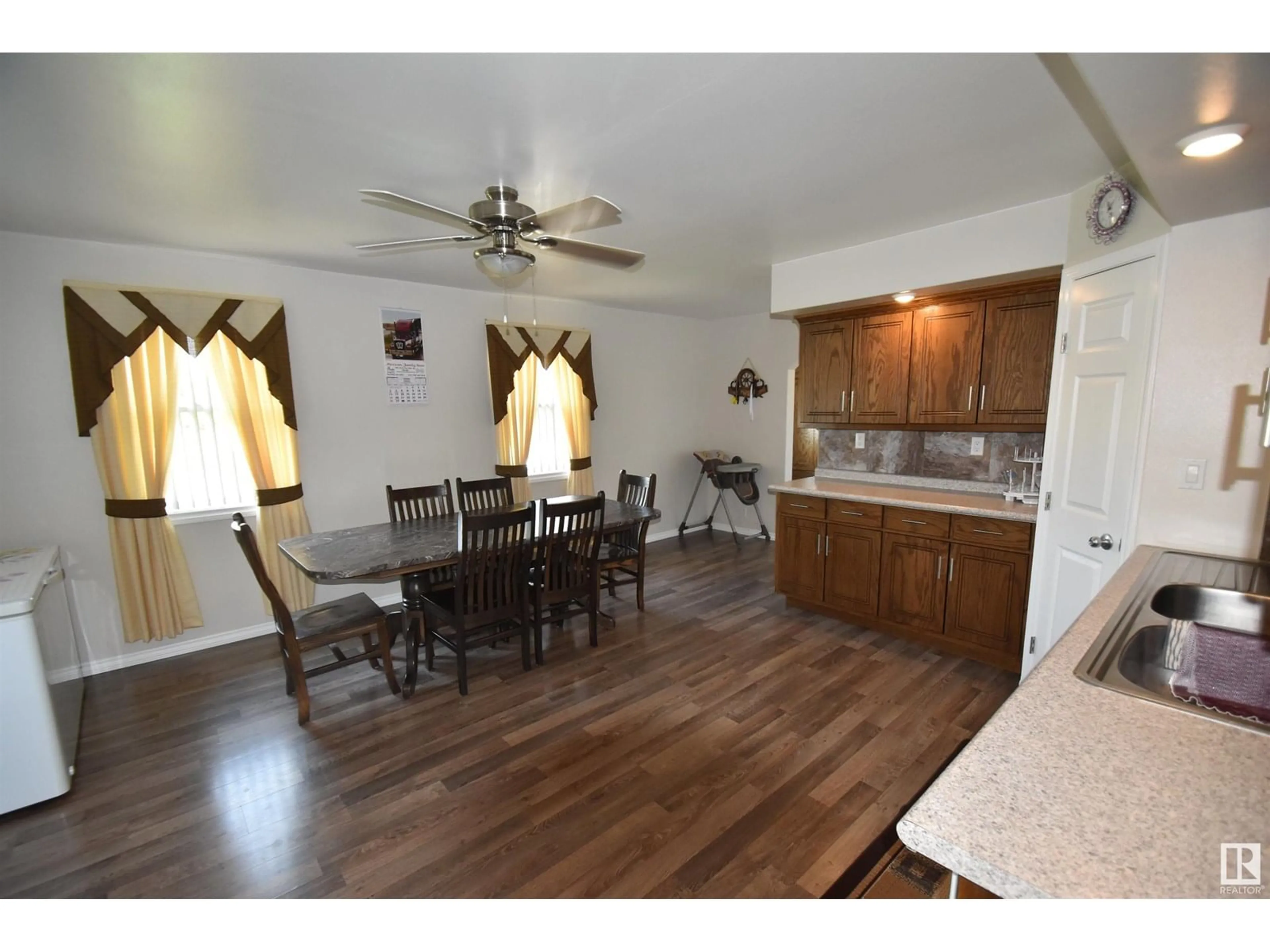 Open concept kitchen, wood/laminate floor for 57104 RNG RD 103, Rural St. Paul County Alberta T0A3A1