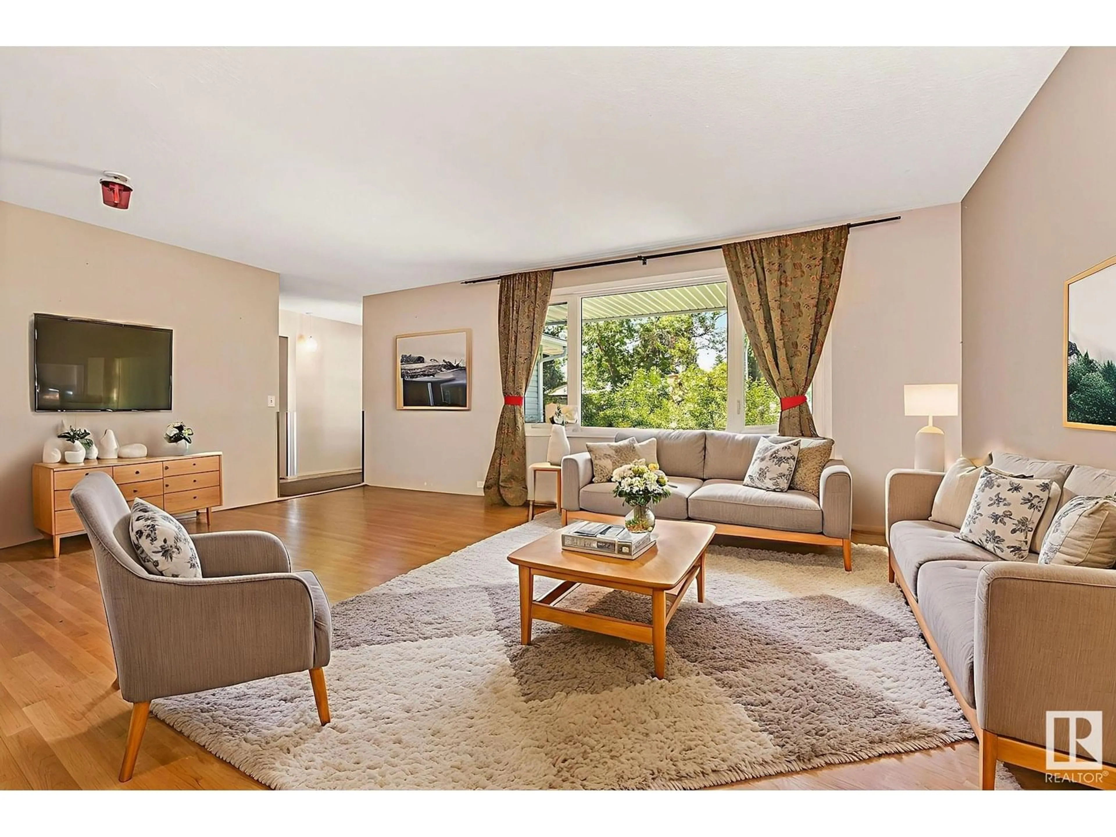 Living room with furniture, wood/laminate floor for 572 SAGE CR, Sherwood Park Alberta T8A0N1