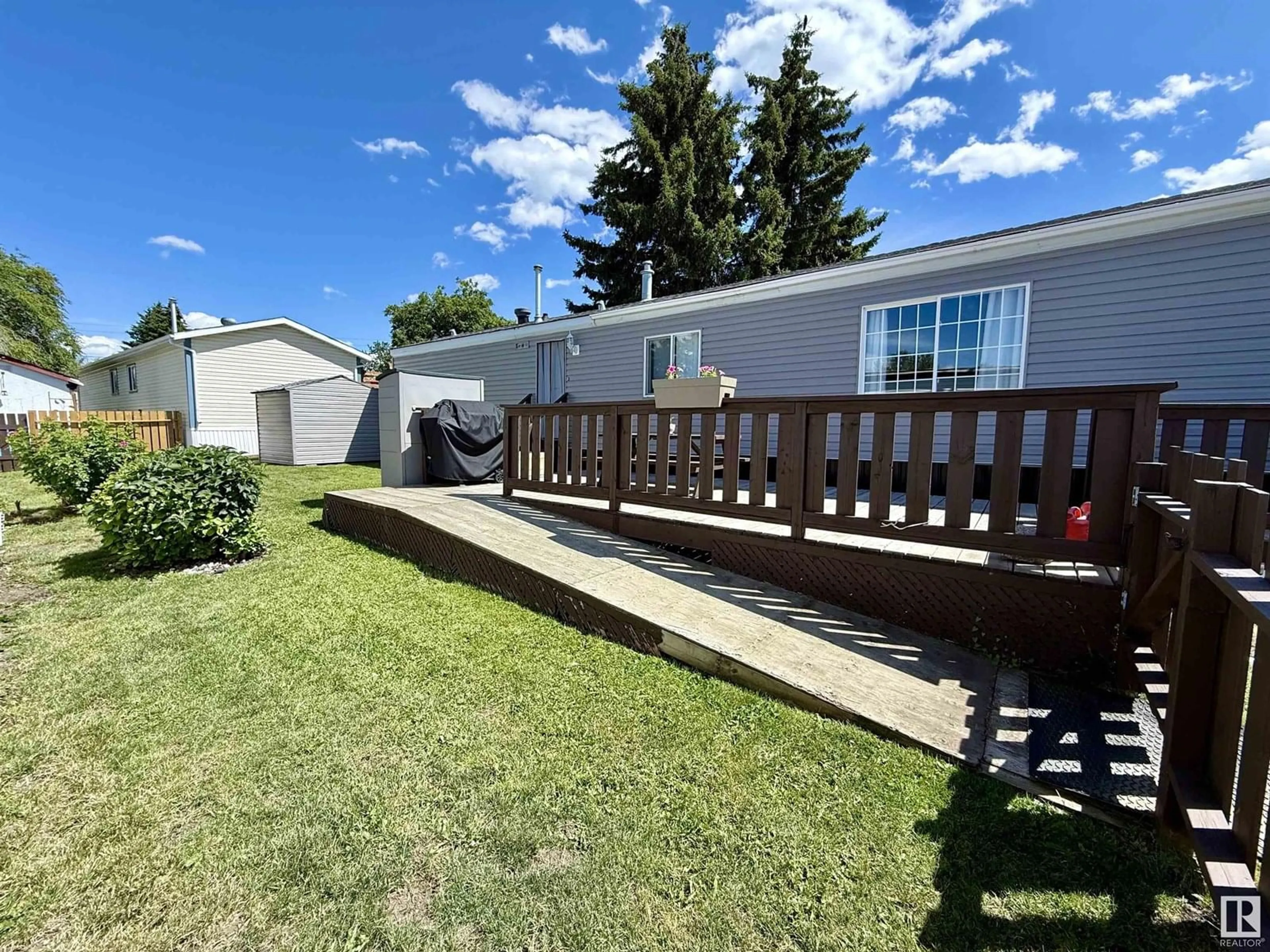 A pic from outside/outdoor area/front of a property/back of a property/a pic from drone, unknown for 305 - 196 CALAHOO RD, Spruce Grove Alberta T7X3L1