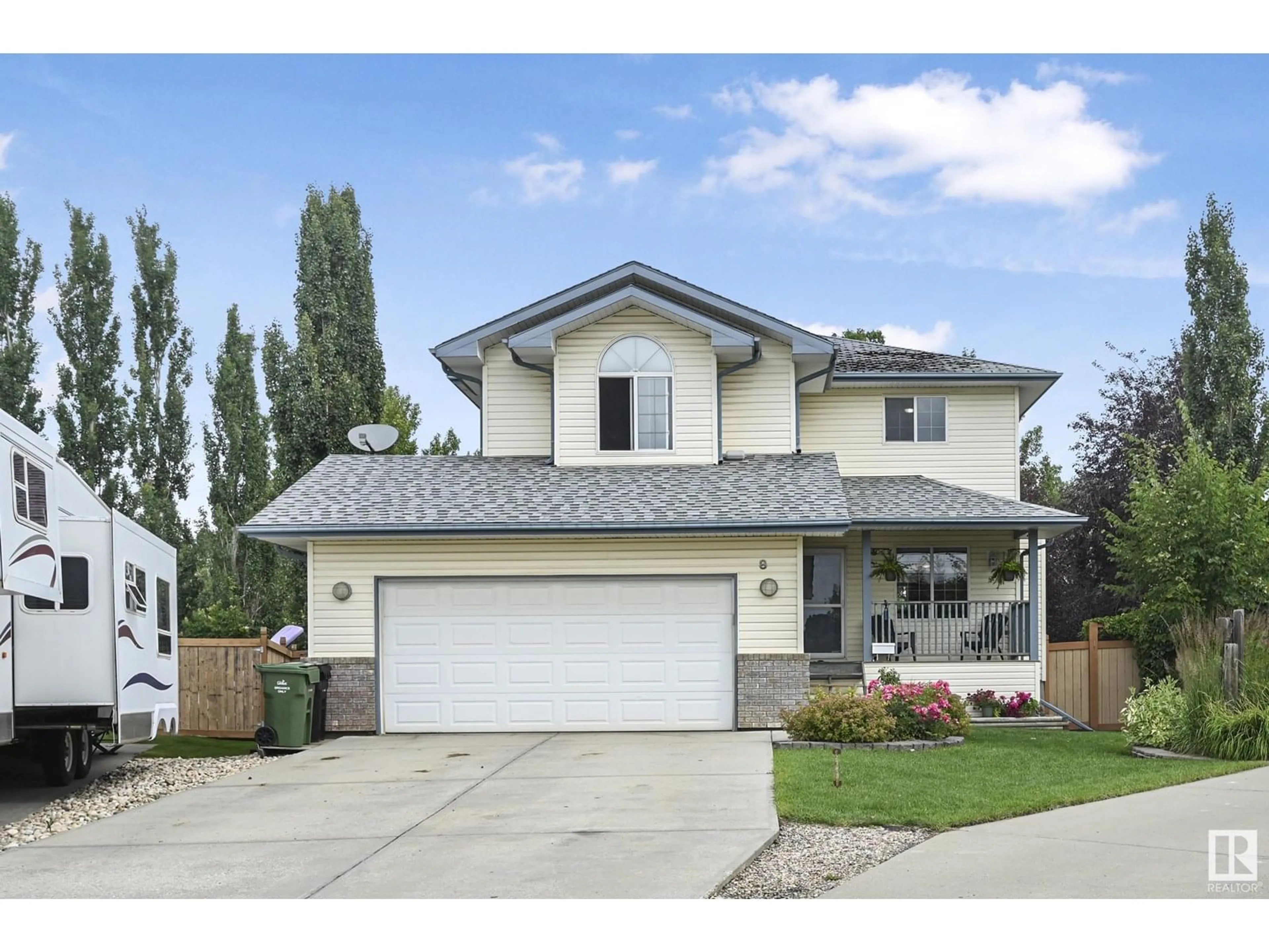 Home with vinyl exterior material, street for 8 WELLS CO, Leduc Alberta T9E8E8
