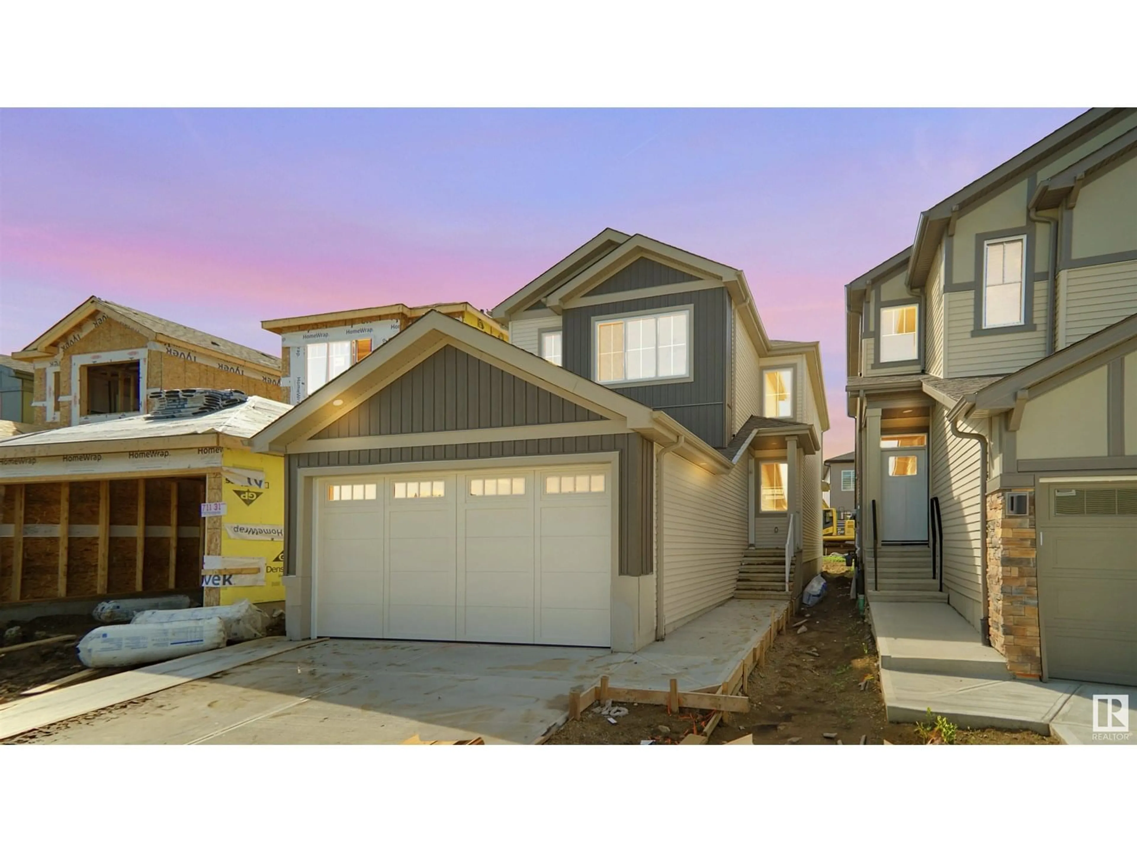 Home with vinyl exterior material, street for 711 31 AV, Edmonton Alberta T6T2V6