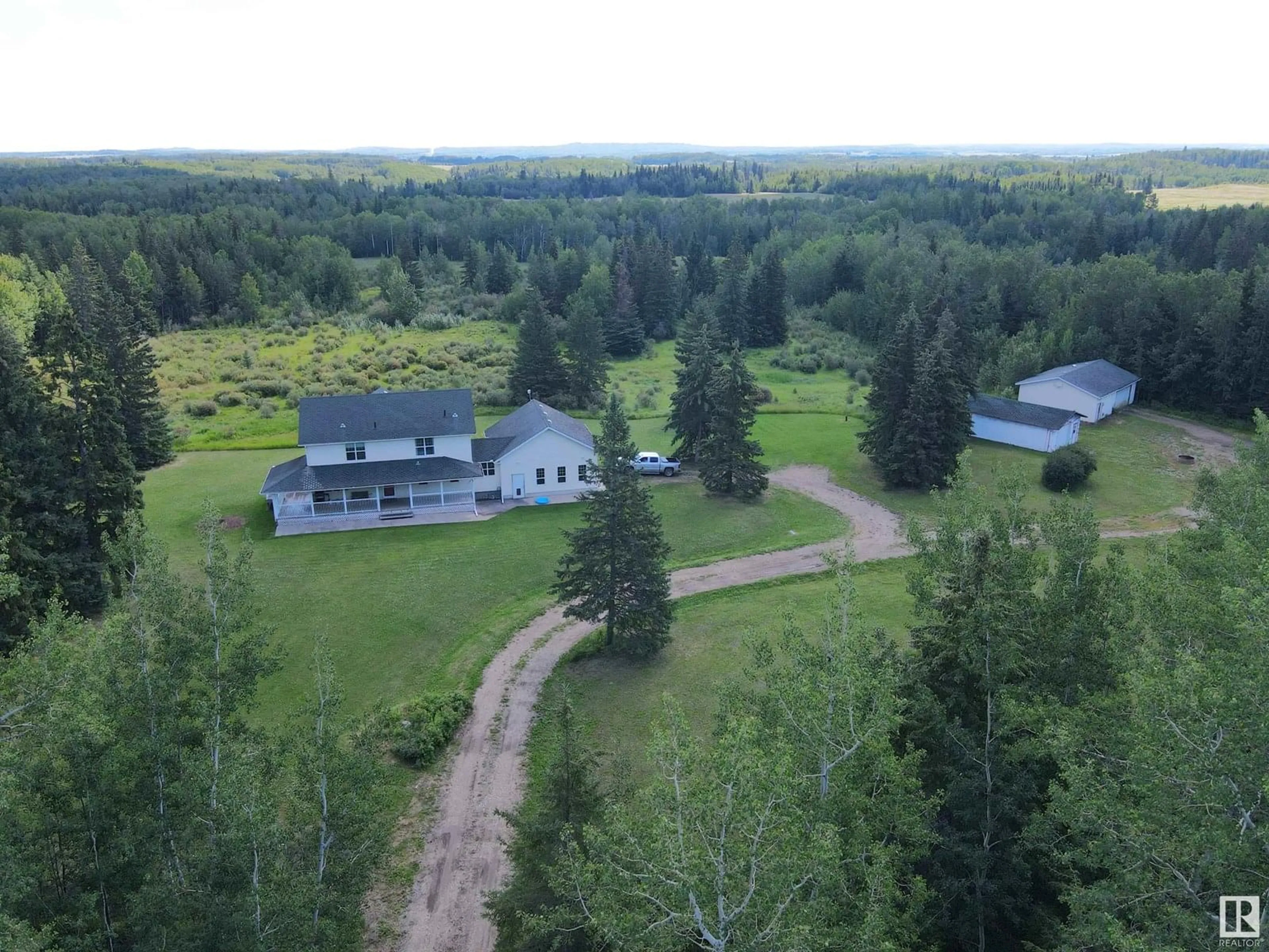A pic from outside/outdoor area/front of a property/back of a property/a pic from drone, forest/trees view for 49531 RANGE ROAD 55, Rural Brazeau County Alberta T0C2H0