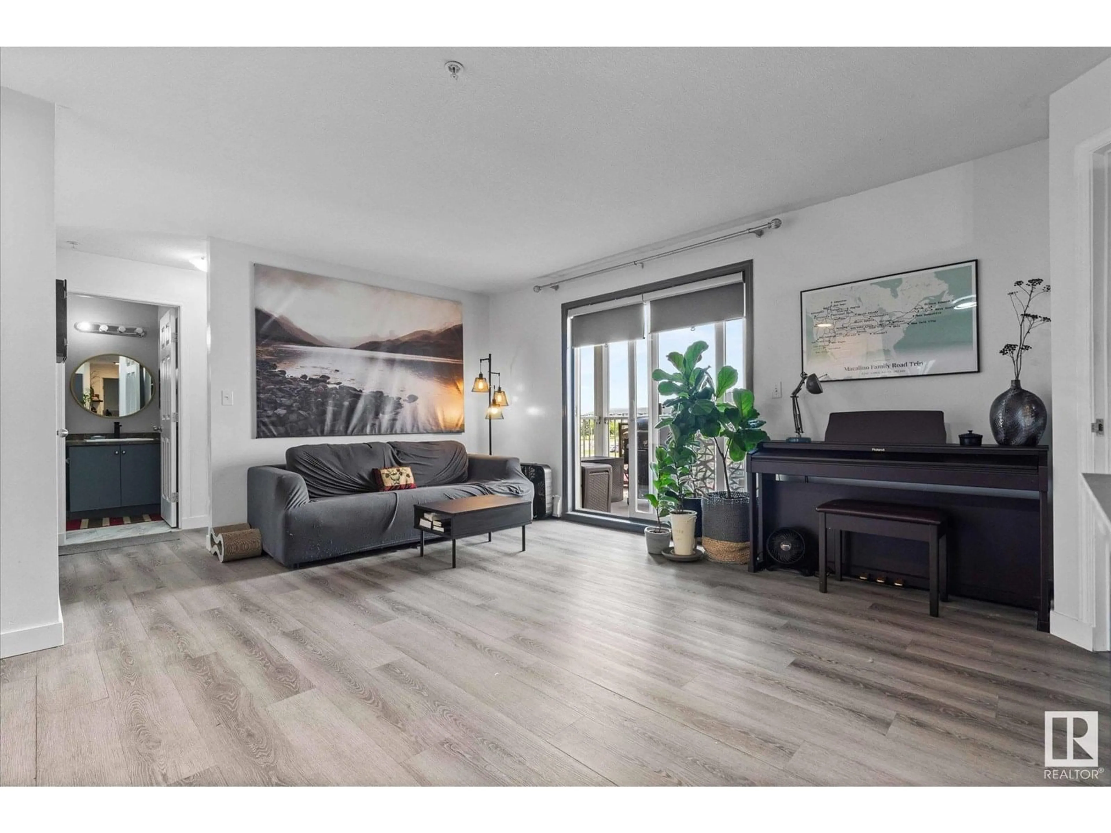 Living room with furniture, wood/laminate floor for #322 - 4309 33 ST, Stony Plain Alberta T7Z0C4