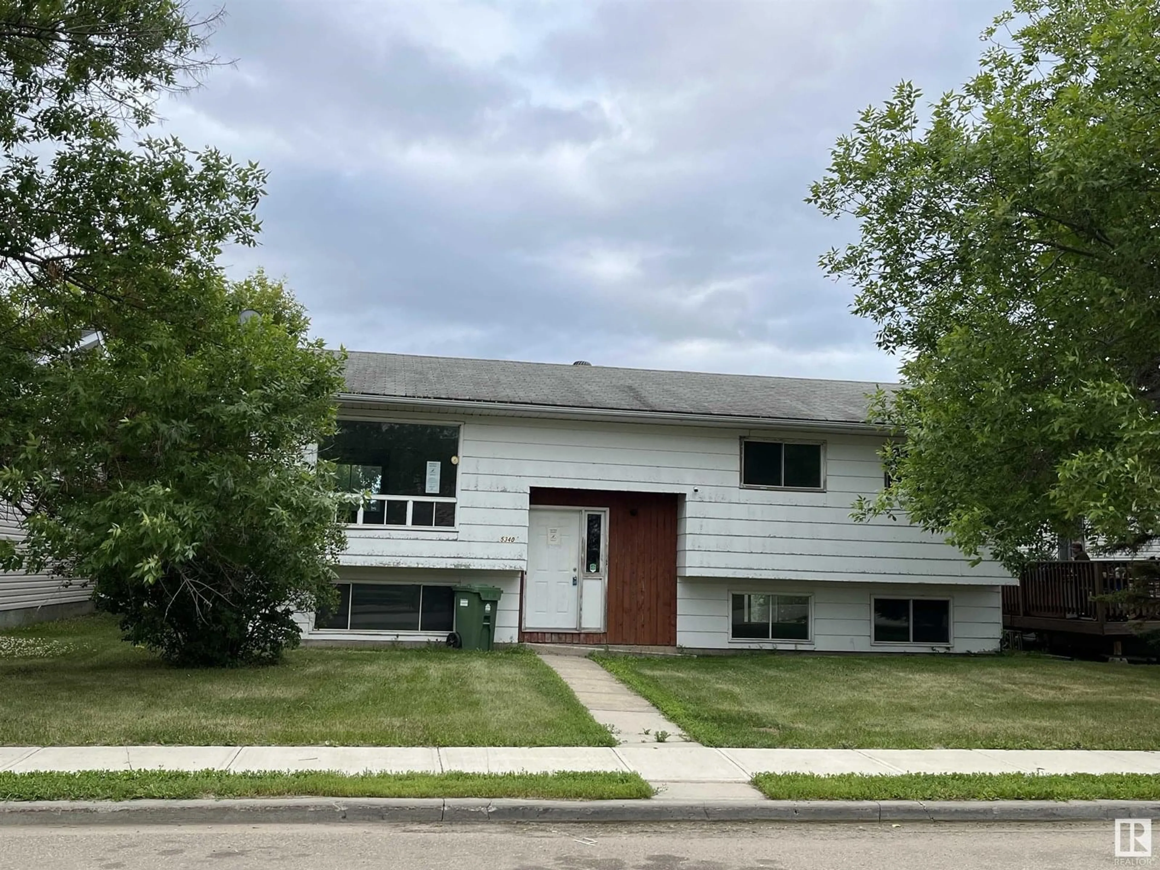 Home with vinyl exterior material, street for 5340 53 AV, Bonnyville Town Alberta T9N2B3