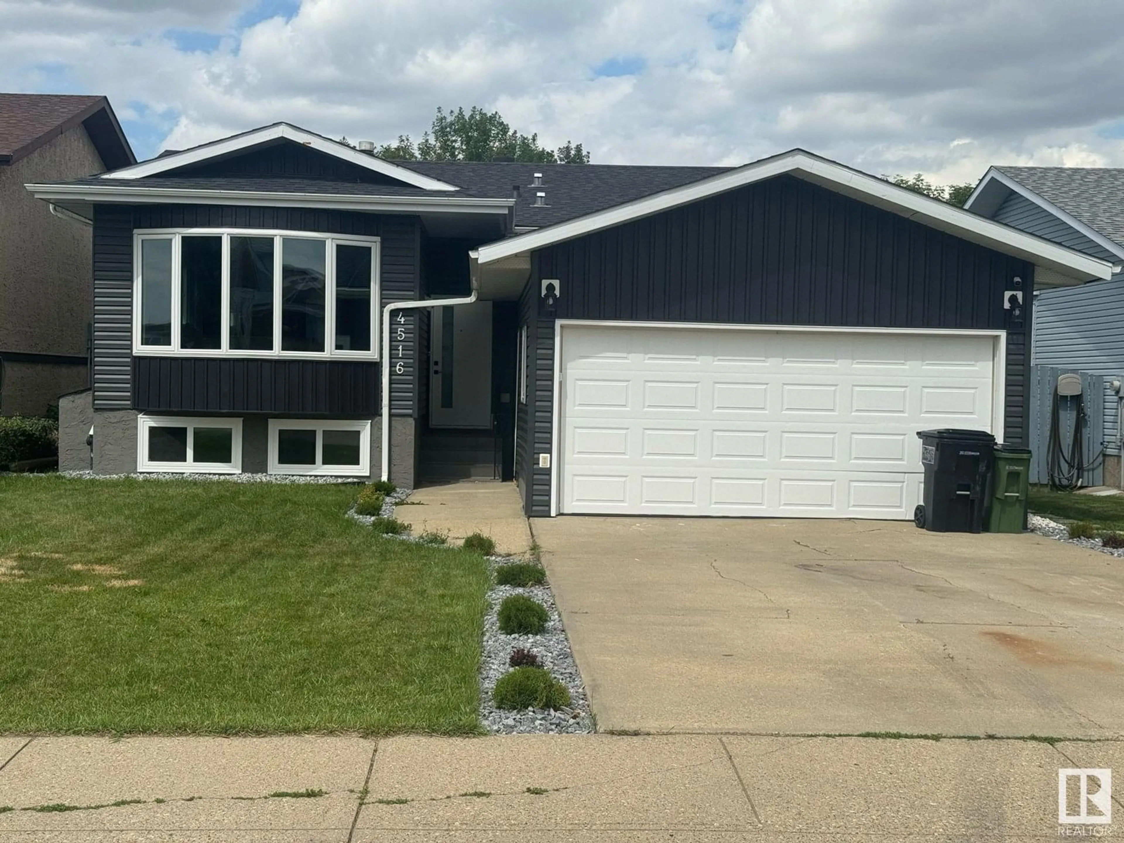 Home with vinyl exterior material, street for 4516 27 AV, Edmonton Alberta T6L4P9