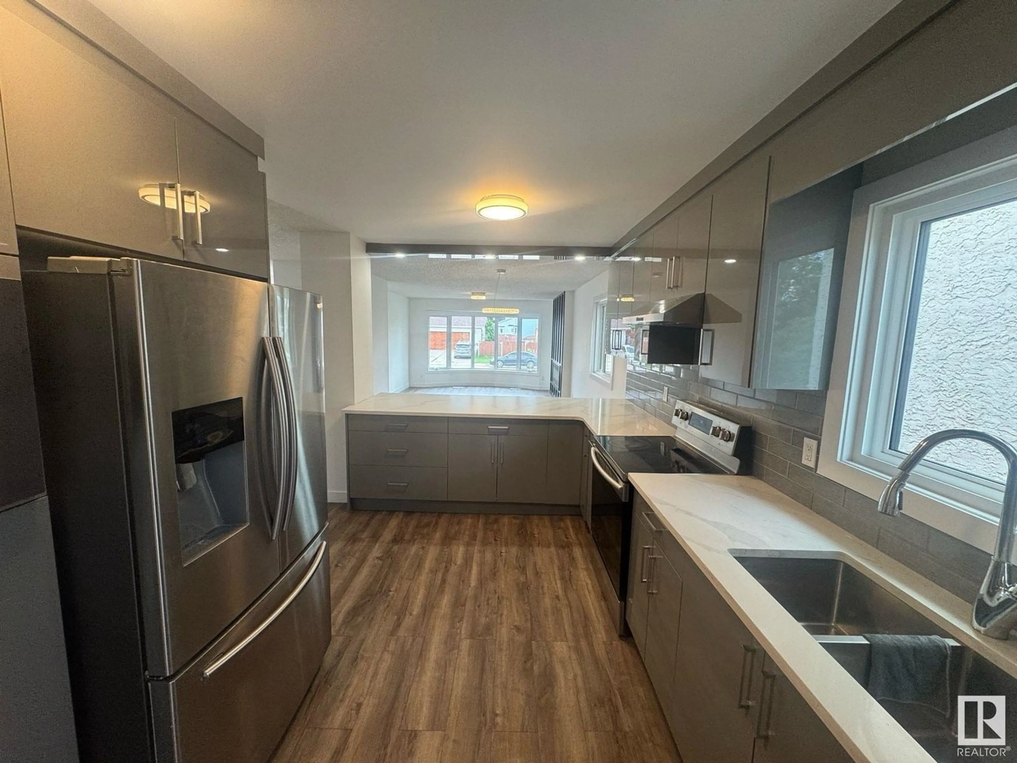 Open concept kitchen, unknown for 4516 27 AV, Edmonton Alberta T6L4P9