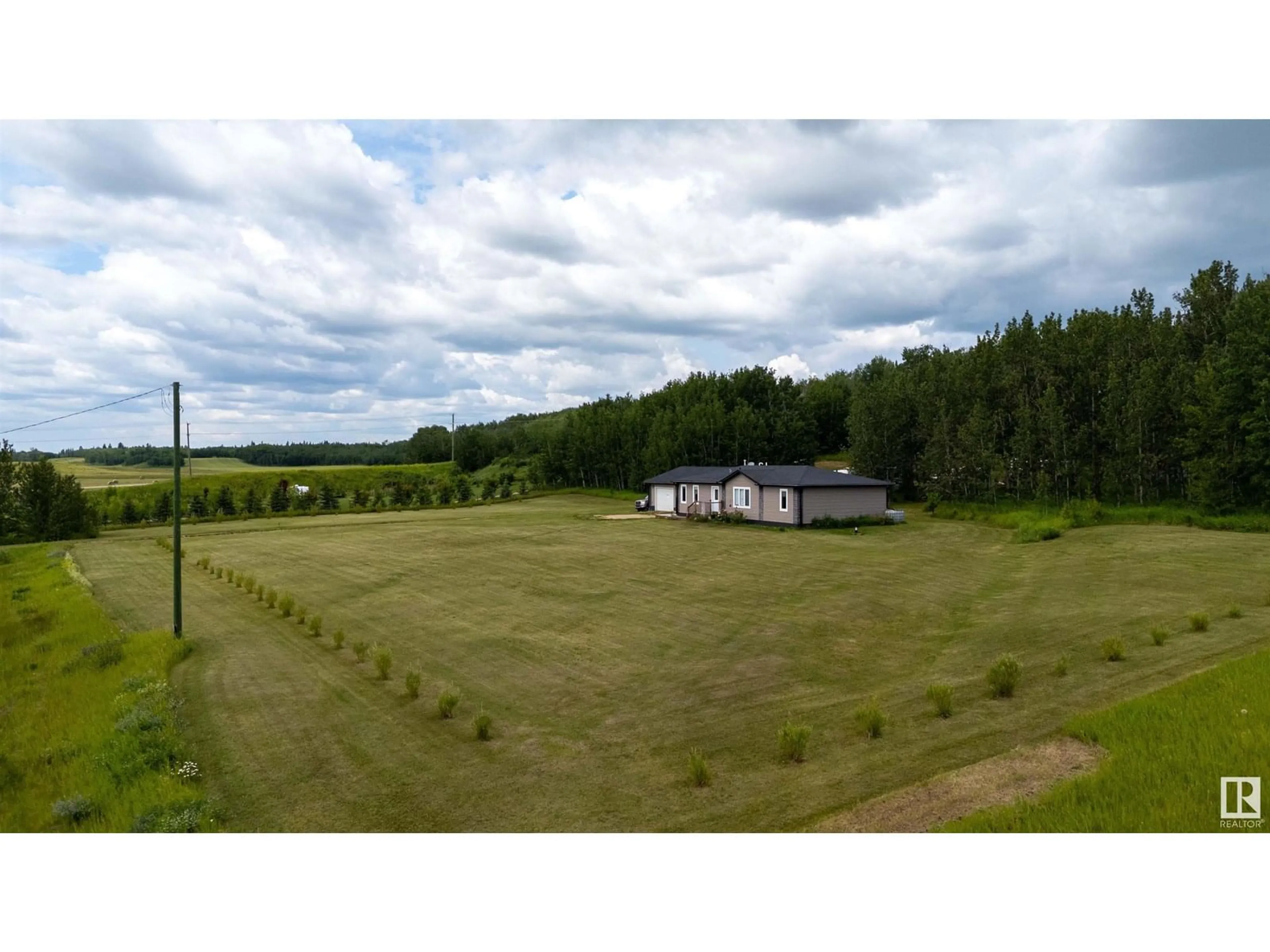 A pic from outside/outdoor area/front of a property/back of a property/a pic from drone, building for 55109 - 422 HWY 777, Rural Lac Ste. Anne County Alberta T0E1V0