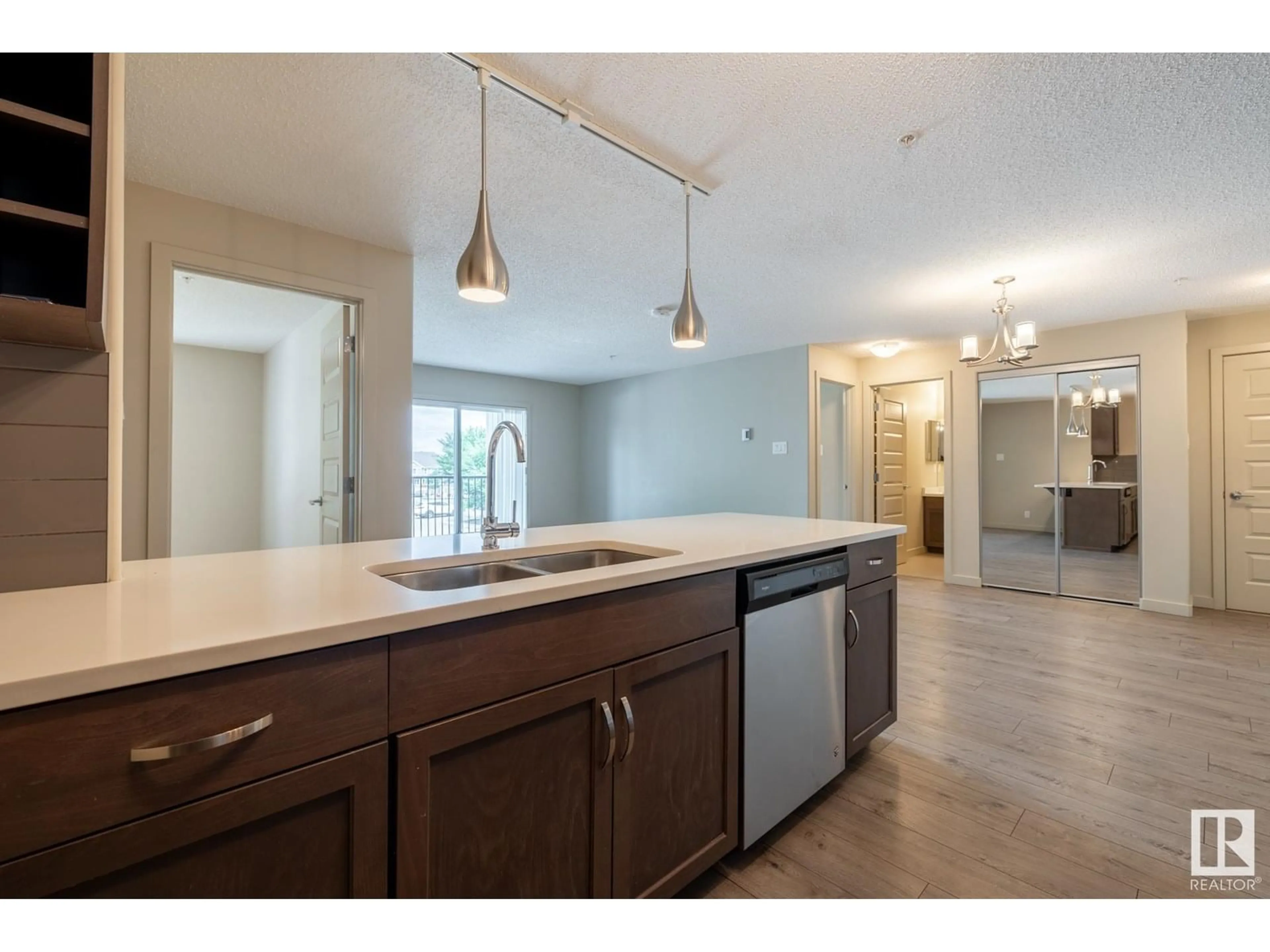 Open concept kitchen, unknown for #216 - 4008 SAVARYN DR, Edmonton Alberta T6X2E5