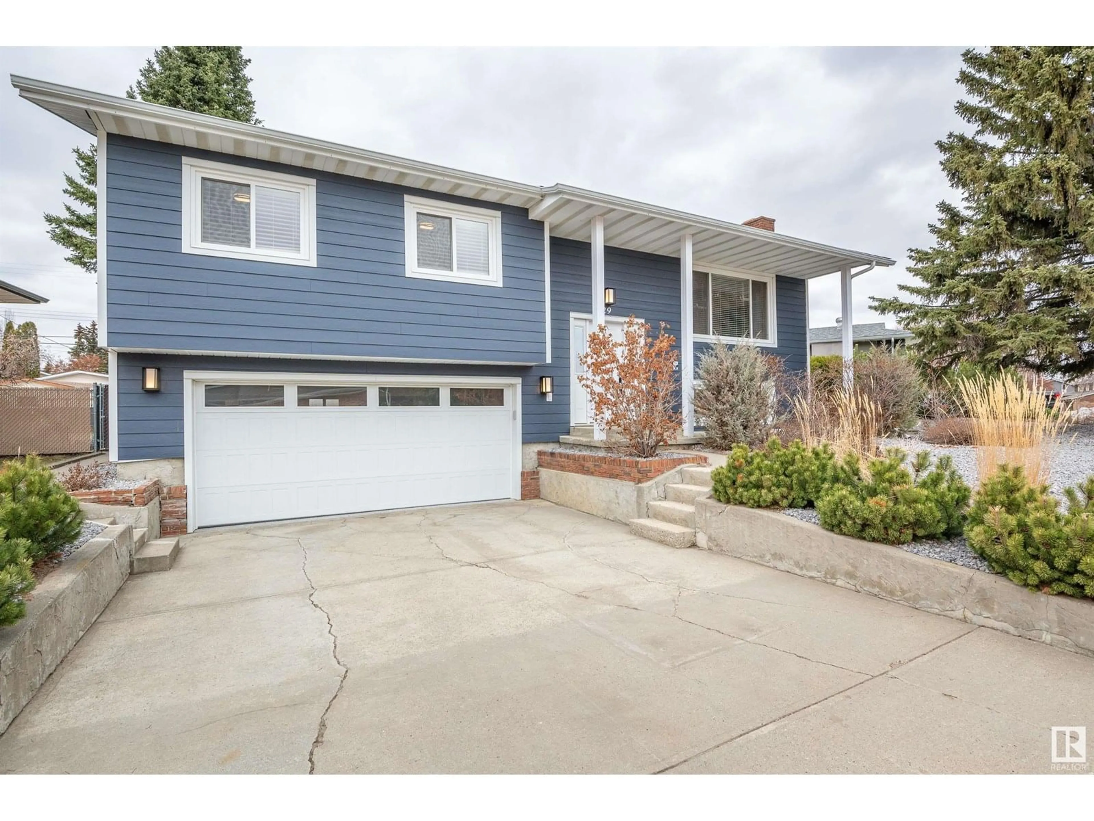 Home with vinyl exterior material, street for 29 PEACE RIVER DR, Devon Alberta T9G1N3