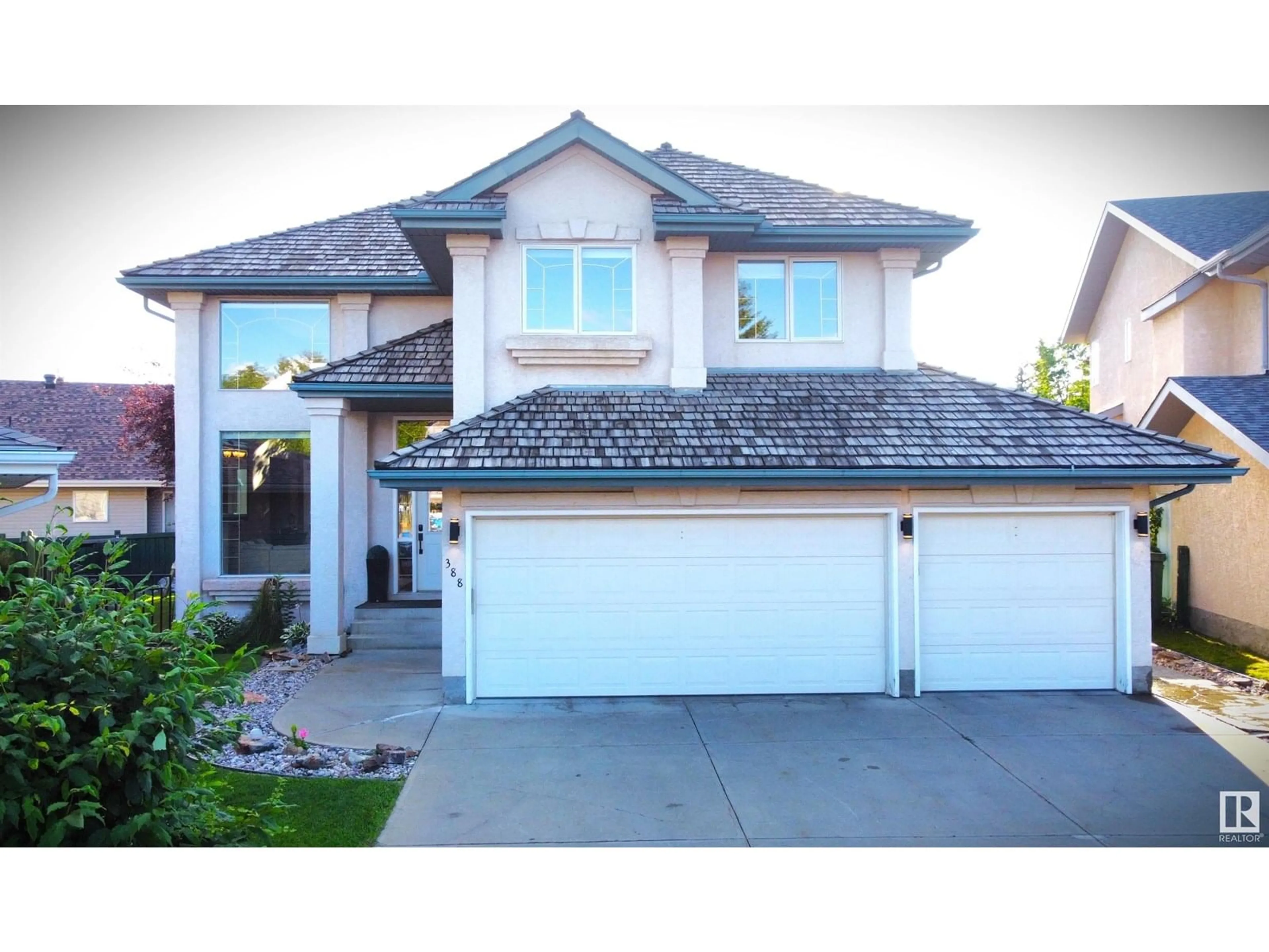 Home with vinyl exterior material, street for 388 HUNTERS RU, Edmonton Alberta T6R2P1