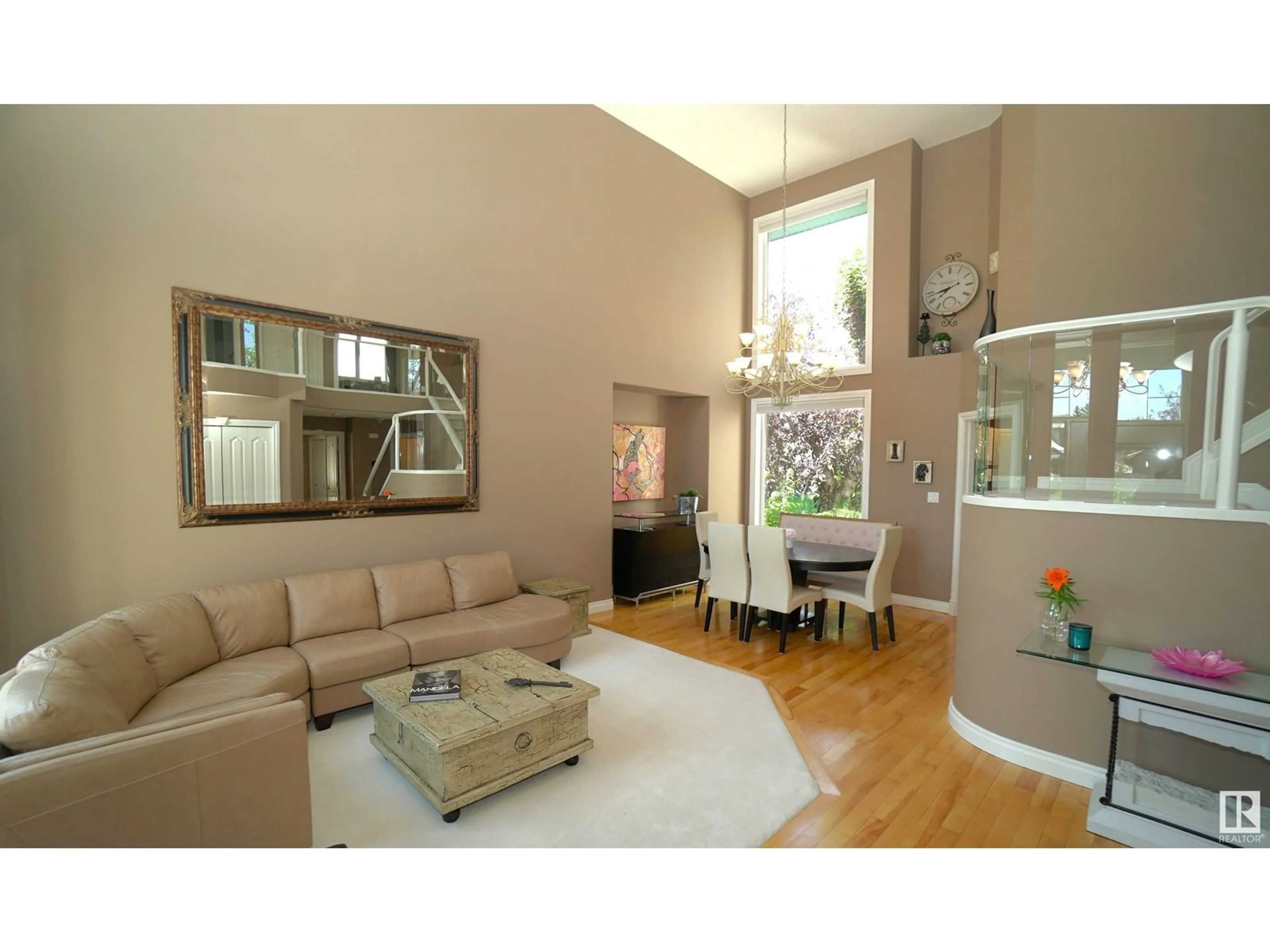 Living room with furniture, wood/laminate floor for 388 HUNTERS RU, Edmonton Alberta T6R2P1