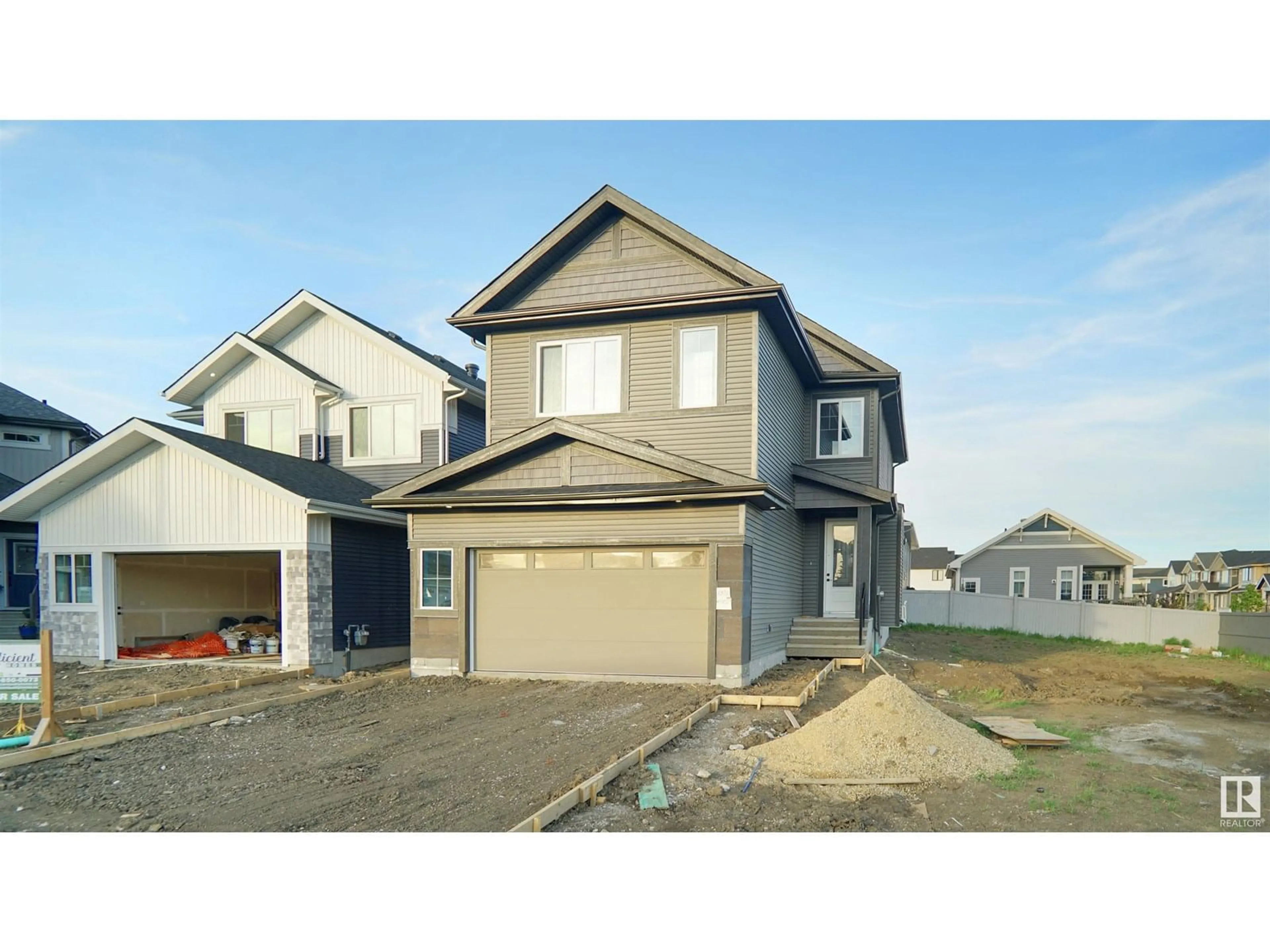 Home with vinyl exterior material, street for 6186 CARR RD, Edmonton Alberta T5E6Y5