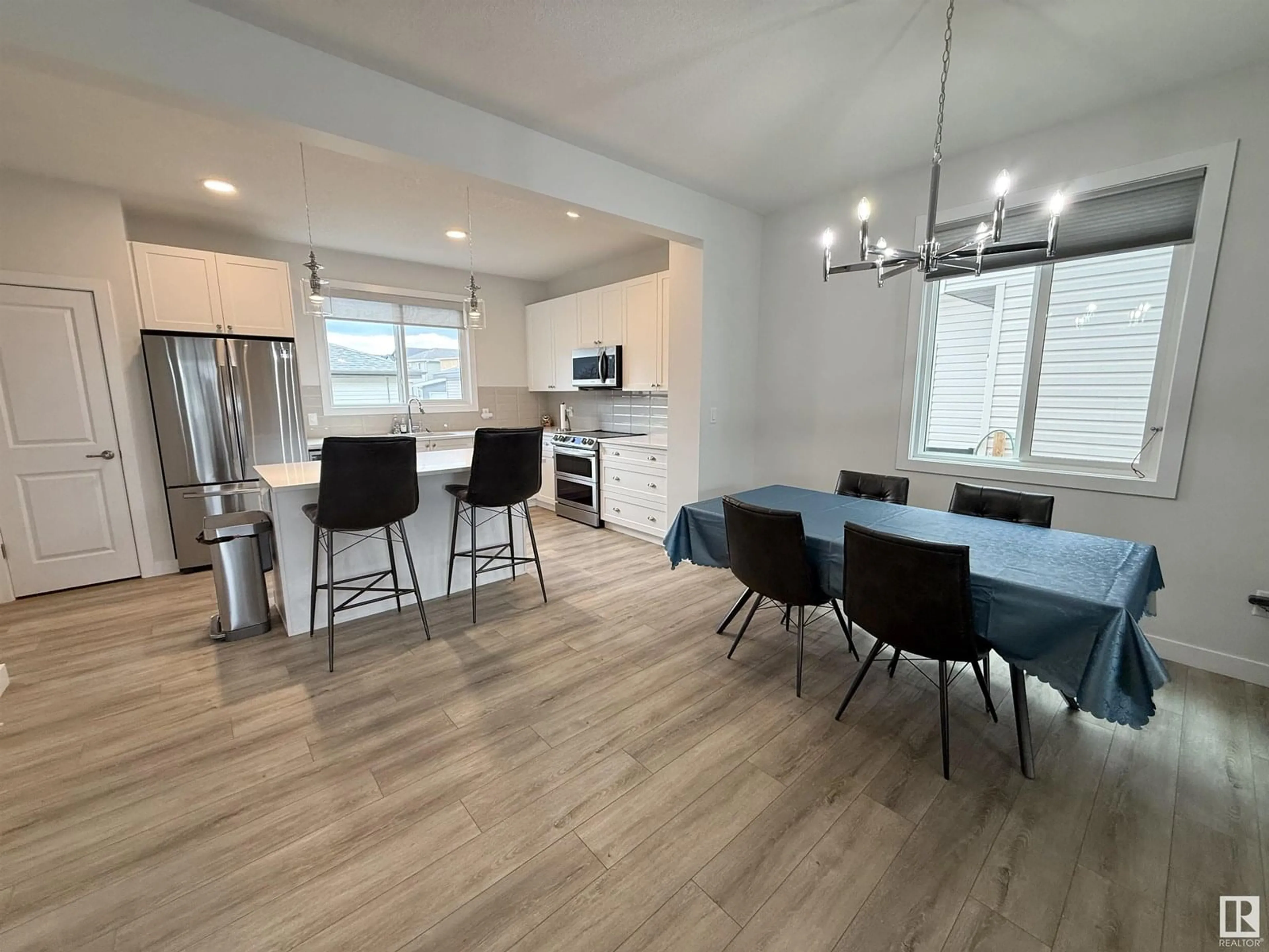 Open concept kitchen, wood/laminate floor for 29 HARRISON GATE, Spruce Grove Alberta T7X0X2