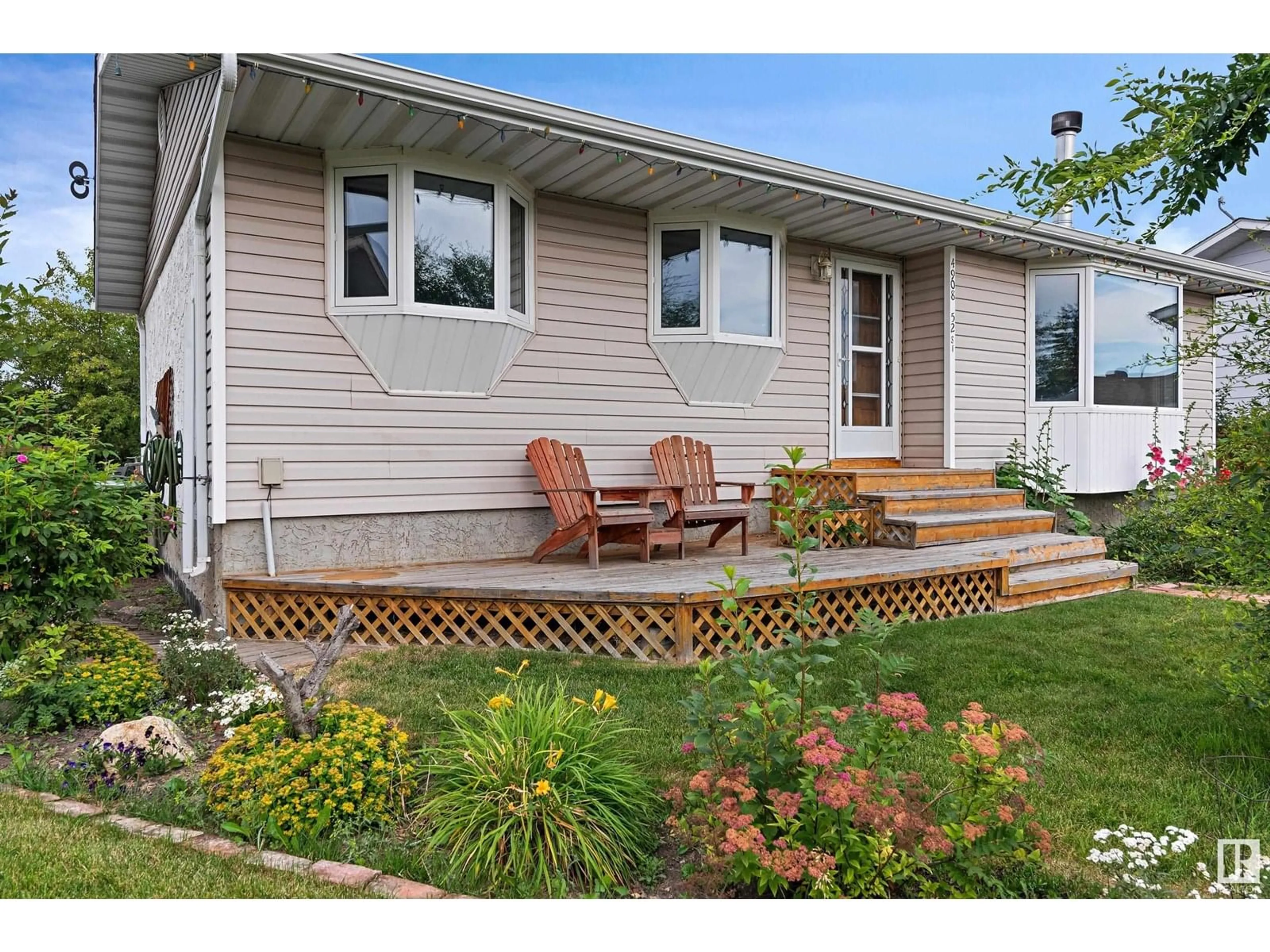 Home with vinyl exterior material, street for 4908 52 ST, Bruderheim Alberta T0B0S0