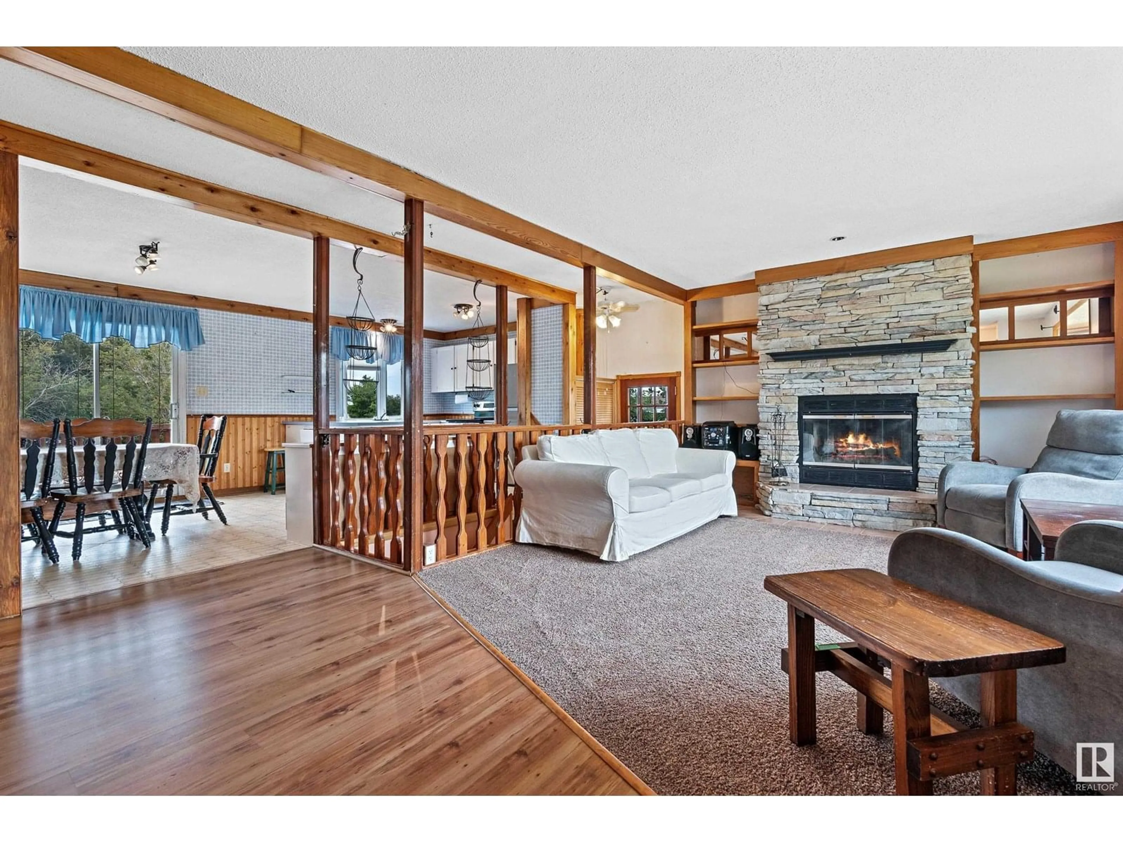 Living room with furniture, wood/laminate floor for 4908 52 ST, Bruderheim Alberta T0B0S0