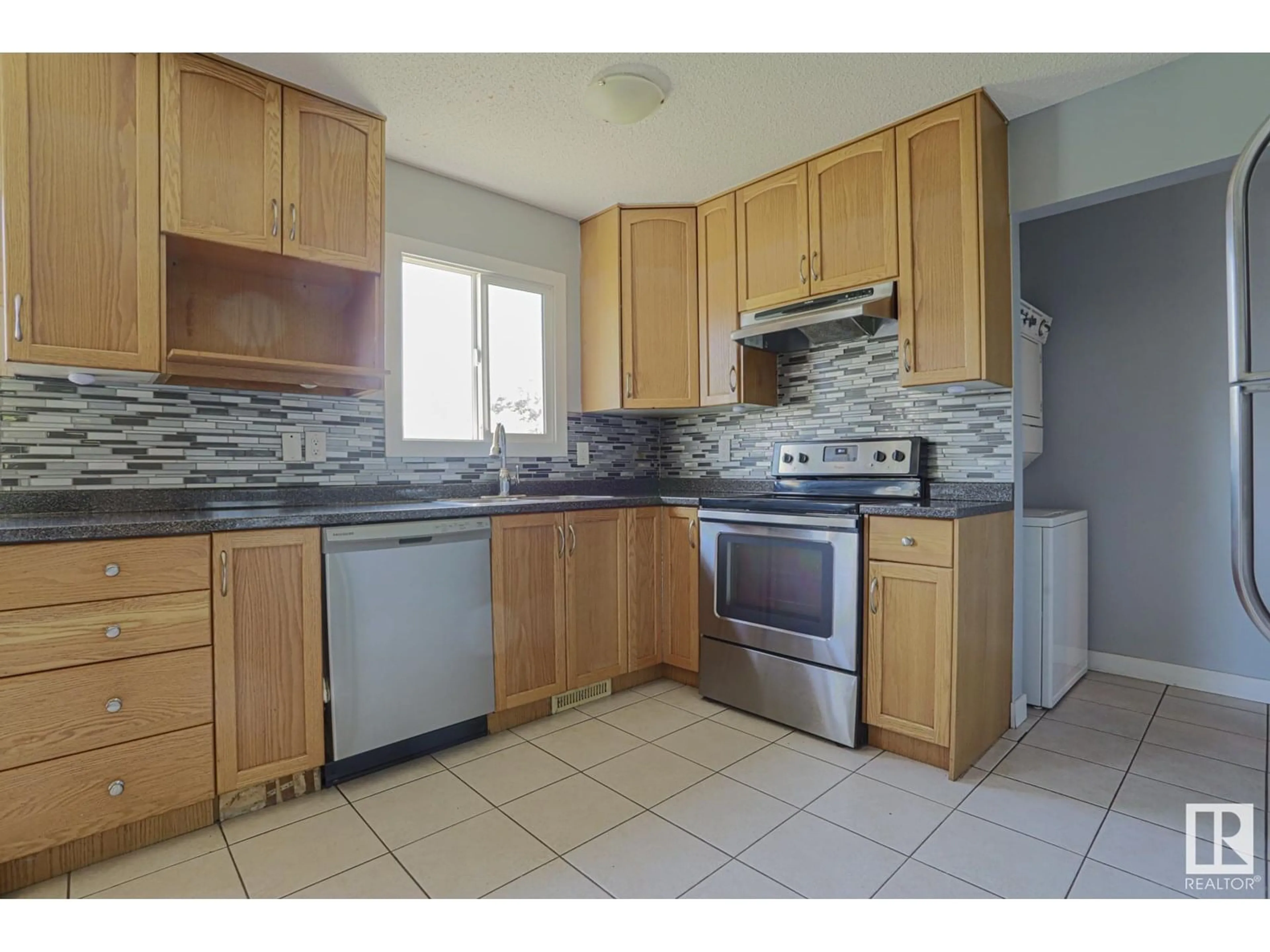 Standard kitchen, ceramic/tile floor for 1411 35 ST, Edmonton Alberta T6L2M2