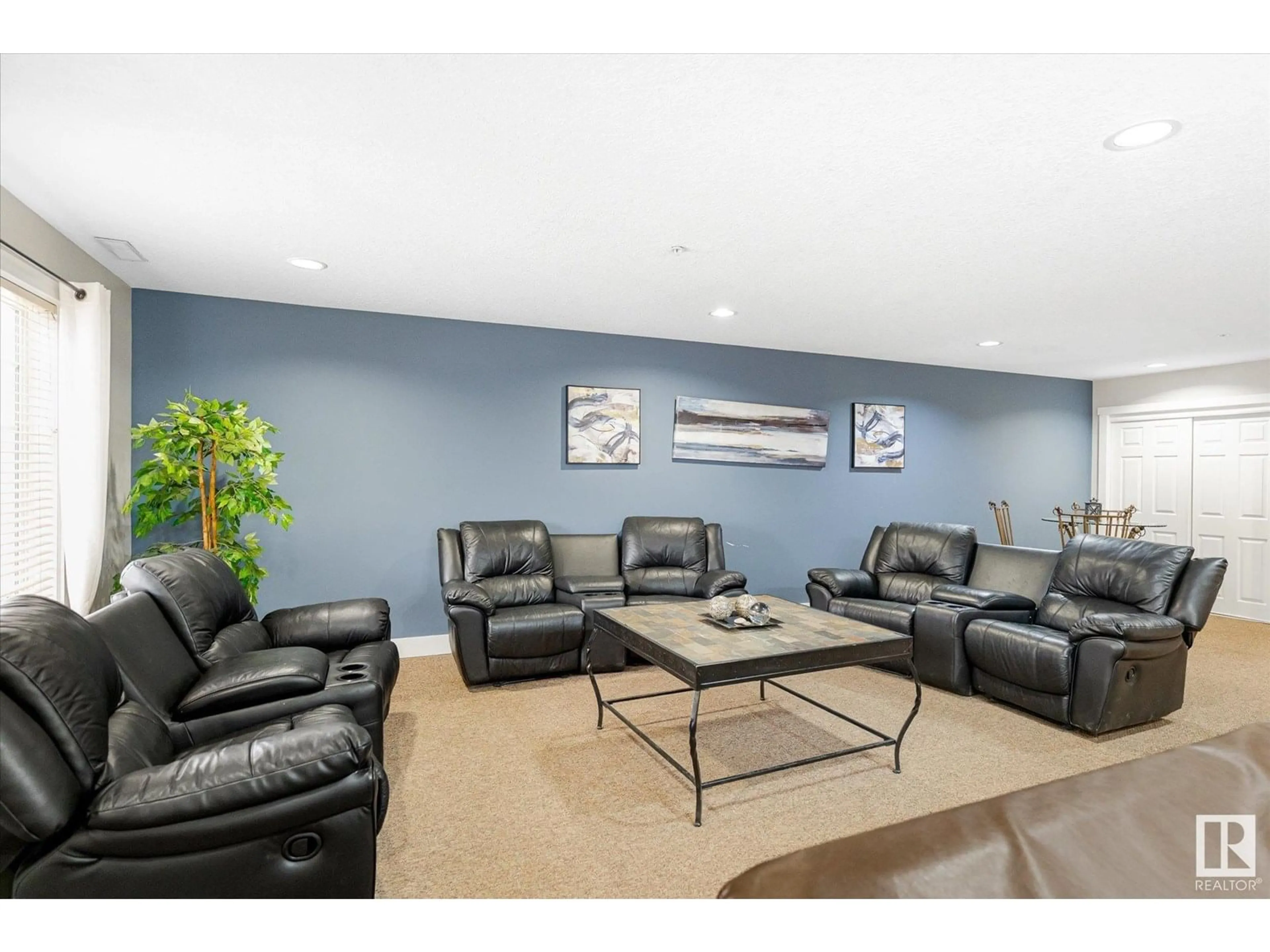 Living room with furniture, unknown for #101 - 2098 BLACKMUD CREEK DR, Edmonton Alberta T6W1T7