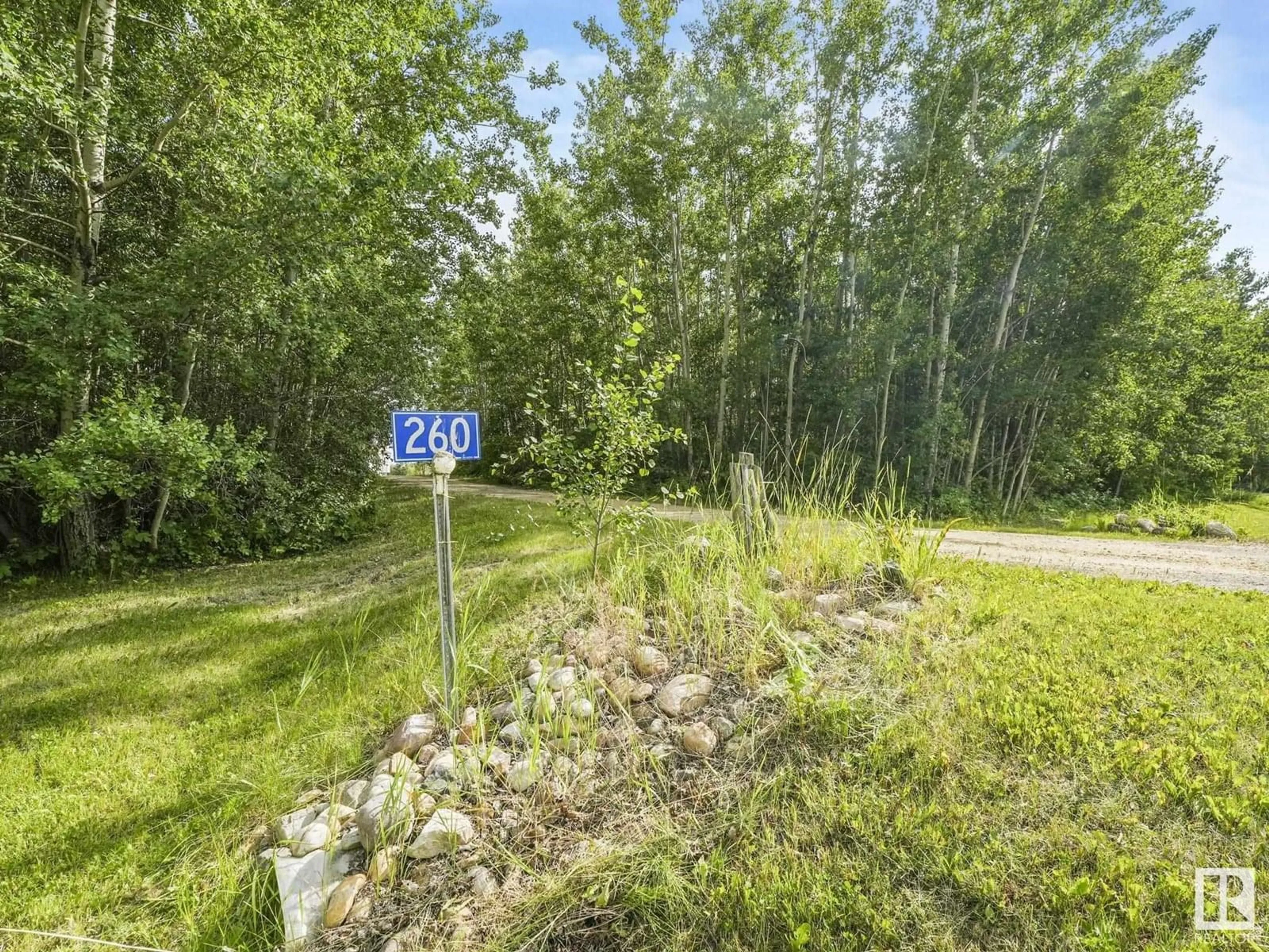 A pic from outside/outdoor area/front of a property/back of a property/a pic from drone, forest/trees view for 260 21539 TWP ROAD 503, Rural Leduc County Alberta T0B3M2
