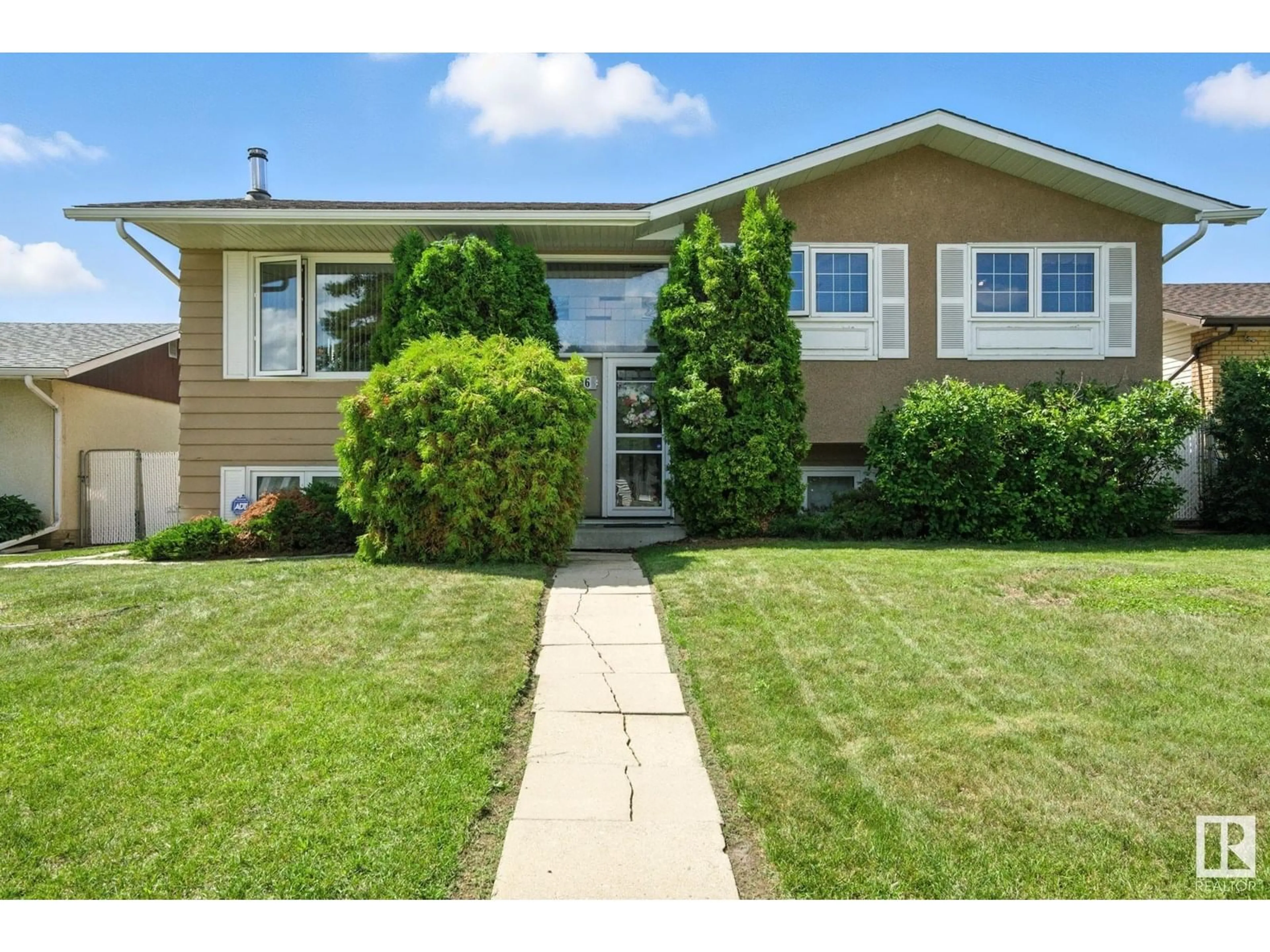 Home with vinyl exterior material, street for 14936 81 ST, Edmonton Alberta T5C1P5