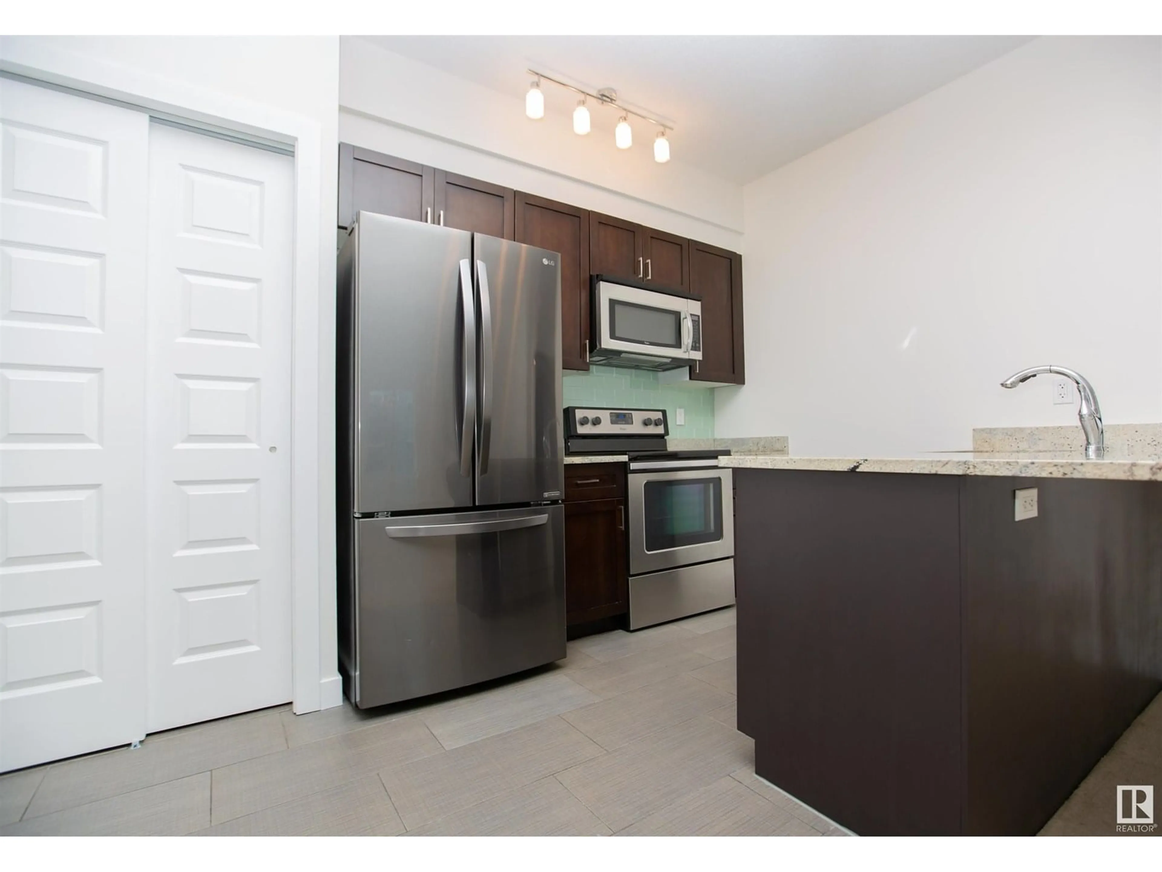 Standard kitchen, unknown for #304 - 1238 WINDERMERE WY, Edmonton Alberta T6W2J3