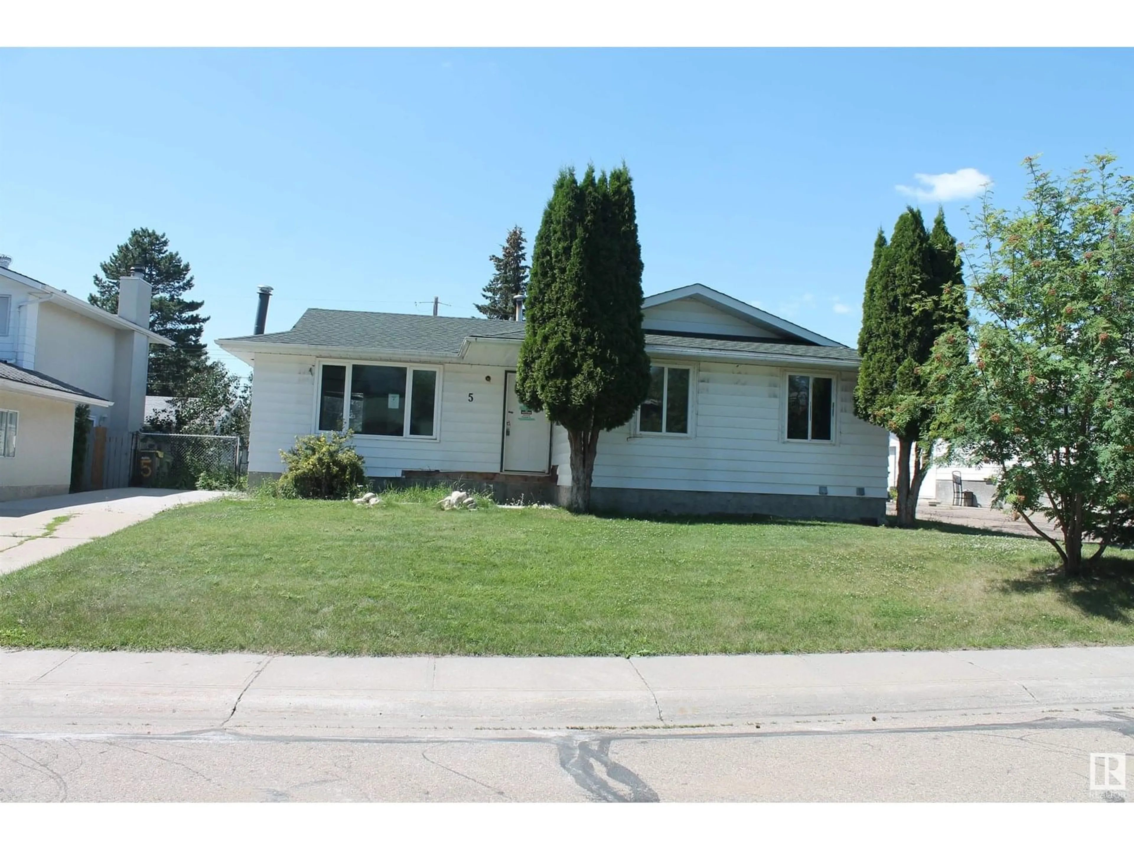 Home with vinyl exterior material, street for 5 PEACE RIVER DR, Devon Alberta T9G1N3