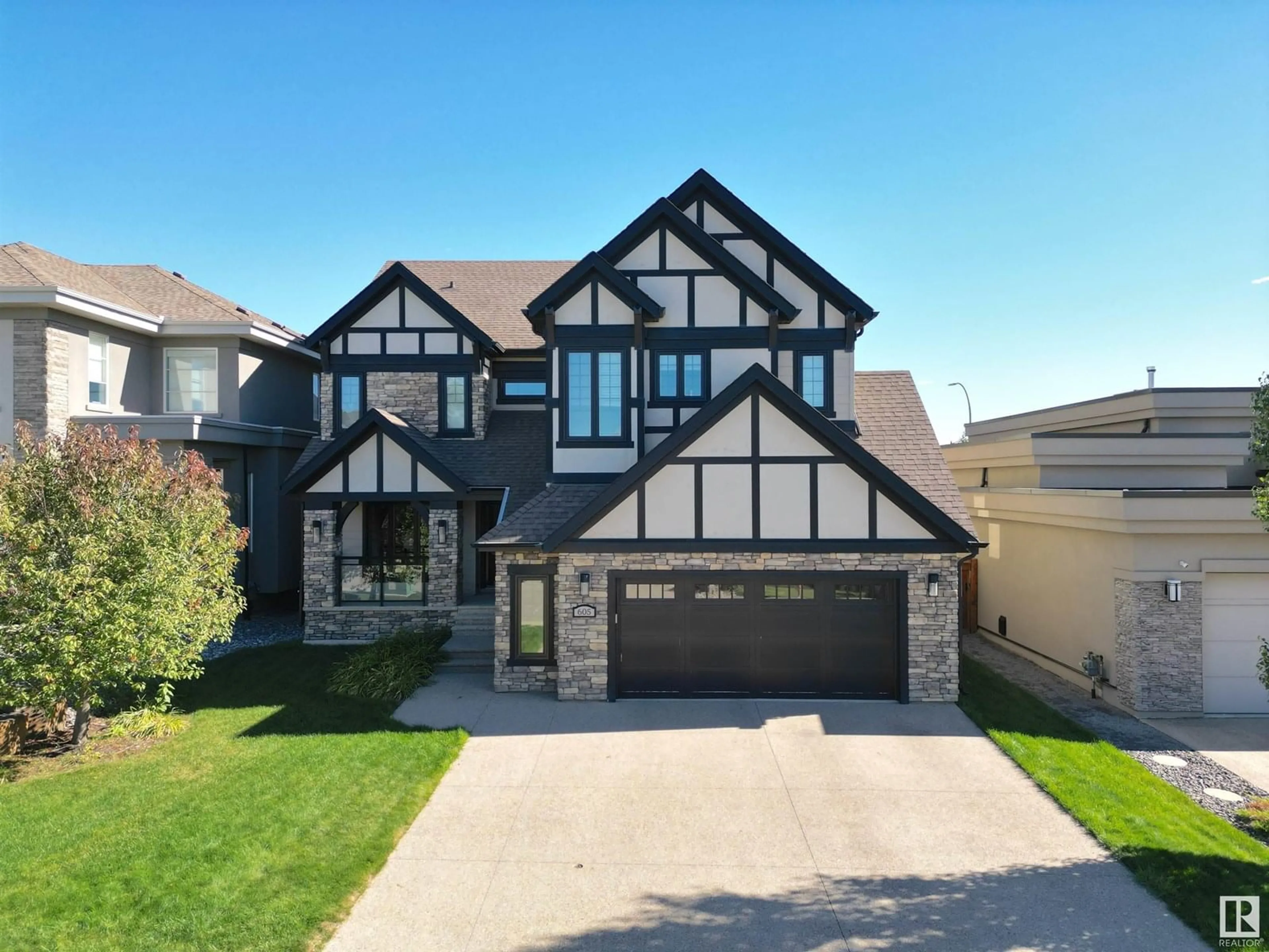 Home with brick exterior material, street for 605 HOWATT DR, Edmonton Alberta T6W2T6