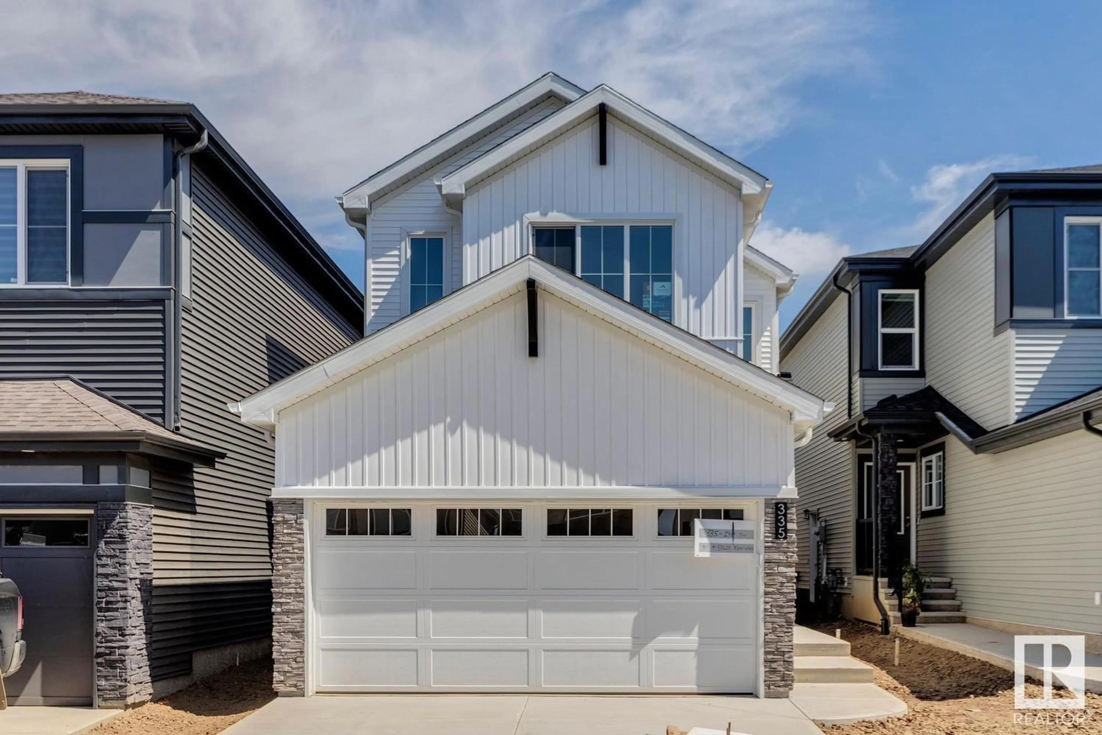 Home with vinyl exterior material, street for SW SW - 335 29 ST, Edmonton Alberta T6X3E7