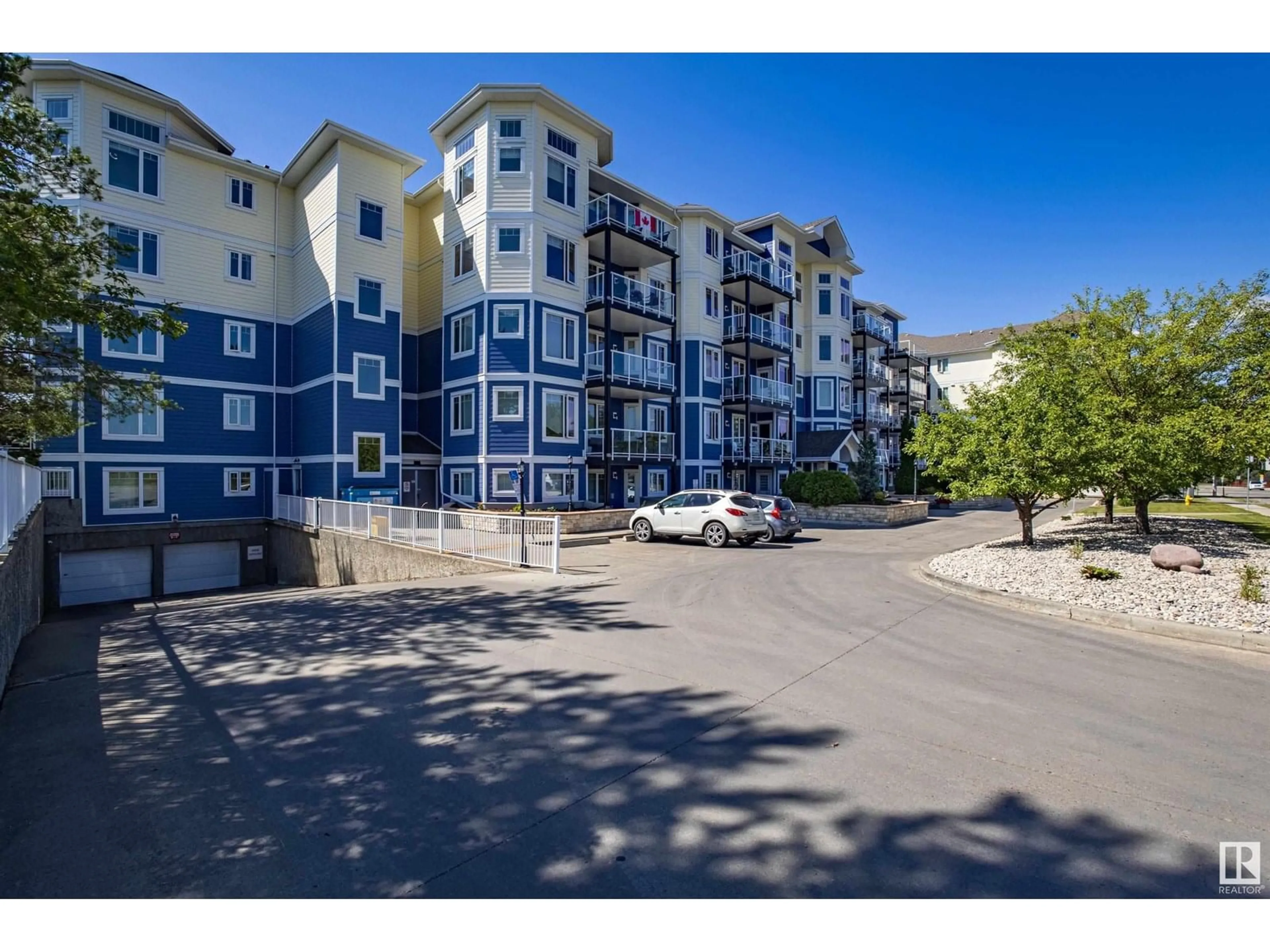 A pic from outside/outdoor area/front of a property/back of a property/a pic from drone, street for #102 - 12111 51 AV, Edmonton Alberta T6H6A3