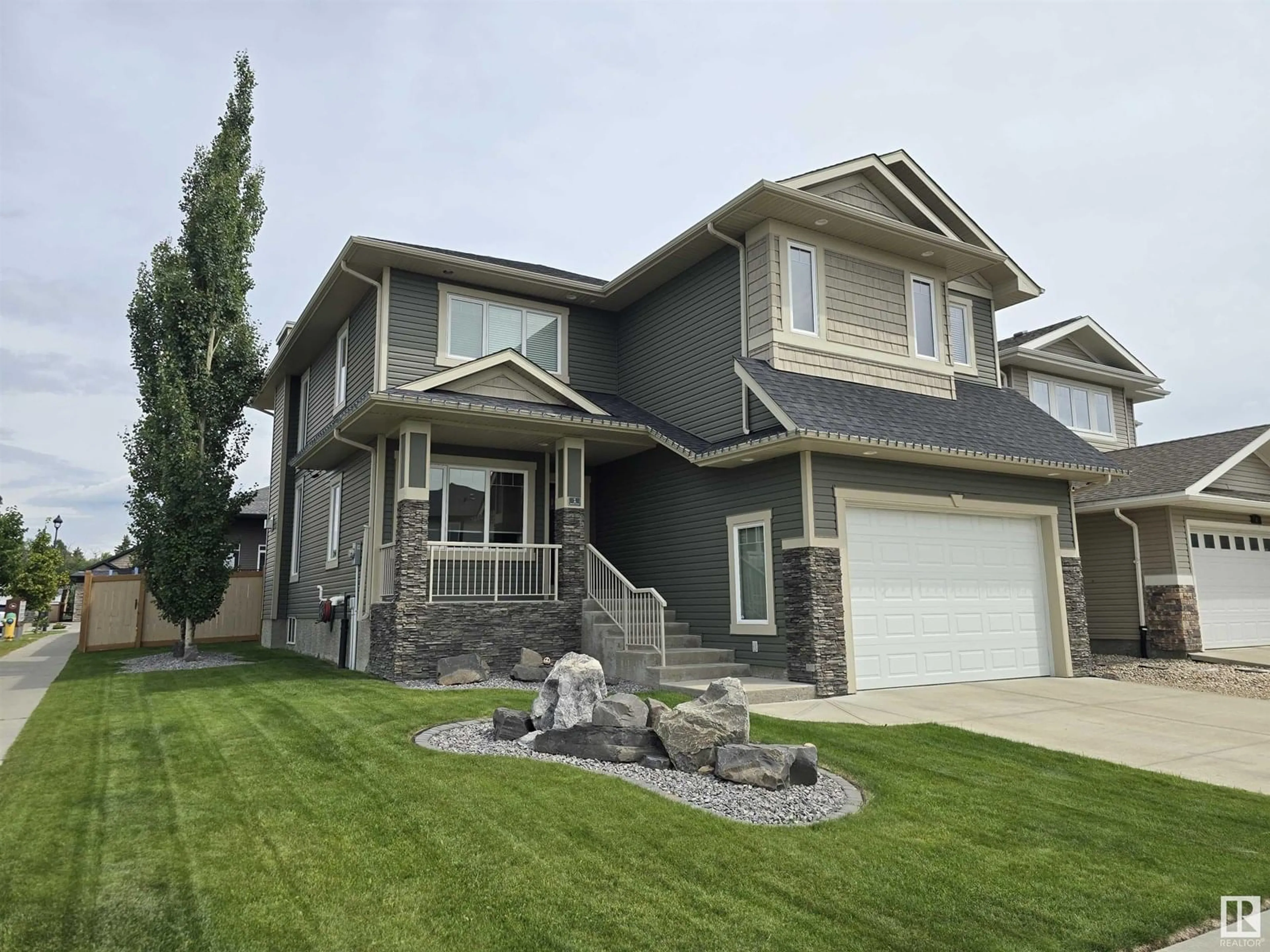 Home with vinyl exterior material, street for 1 WESTLIN DR, Leduc Alberta T9E0N8