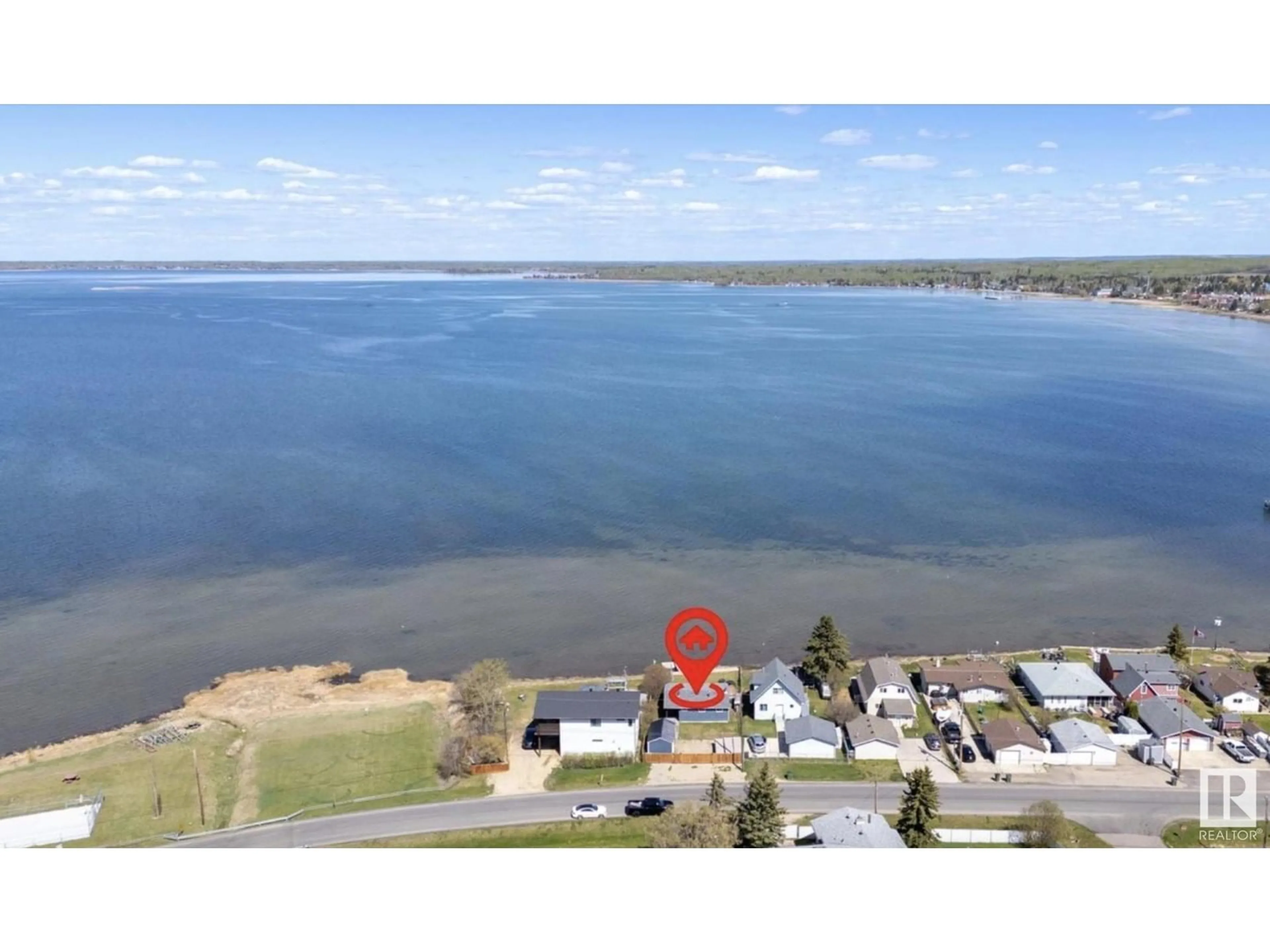 A pic from outside/outdoor area/front of a property/back of a property/a pic from drone, water/lake/river/ocean view for 6330 STE ANNE TRAIL, Rural Lac Ste. Anne County Alberta T0E0A0