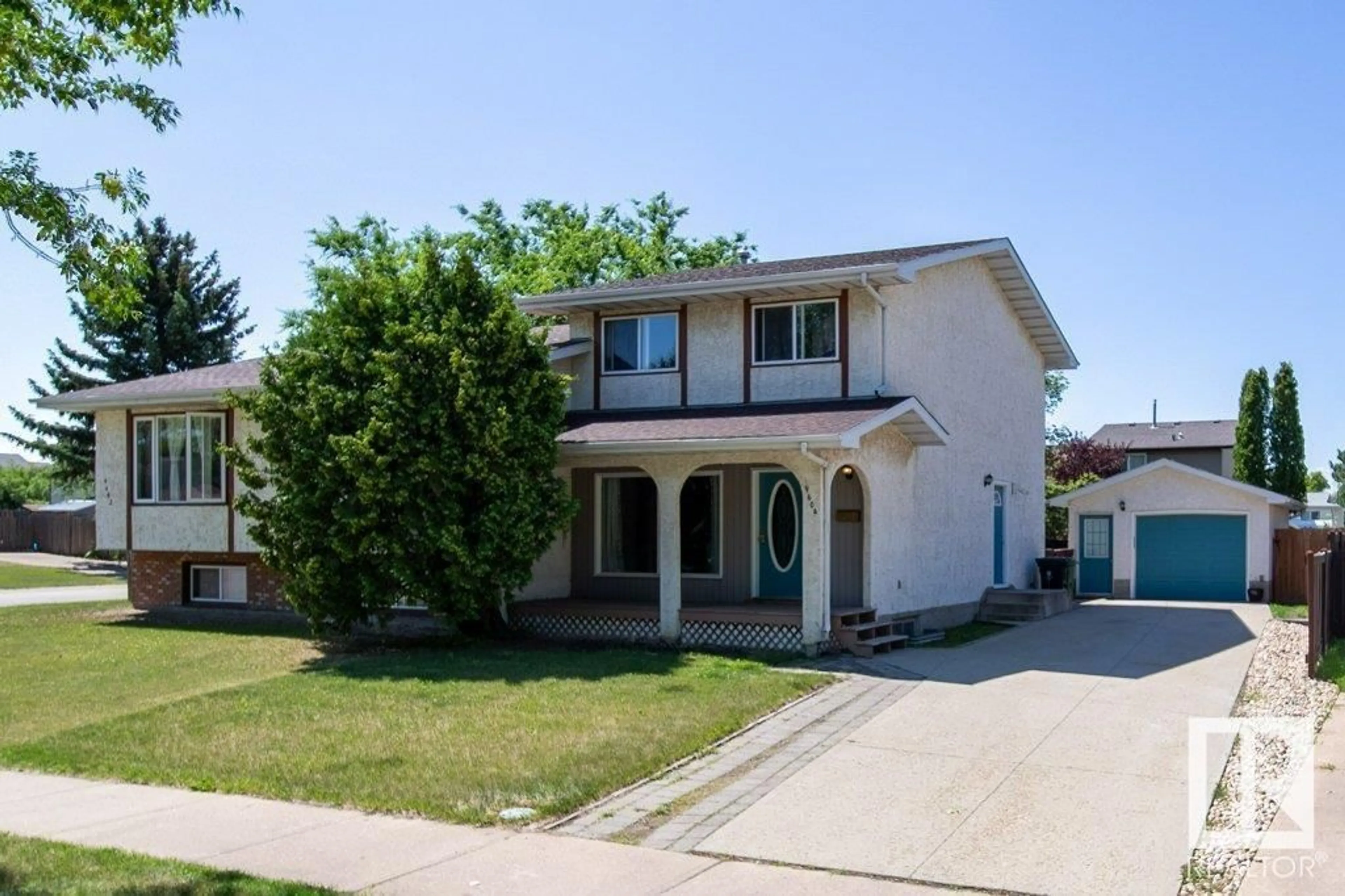 Home with vinyl exterior material, street for 9604 82 ST, Fort Saskatchewan Alberta T8L3J2