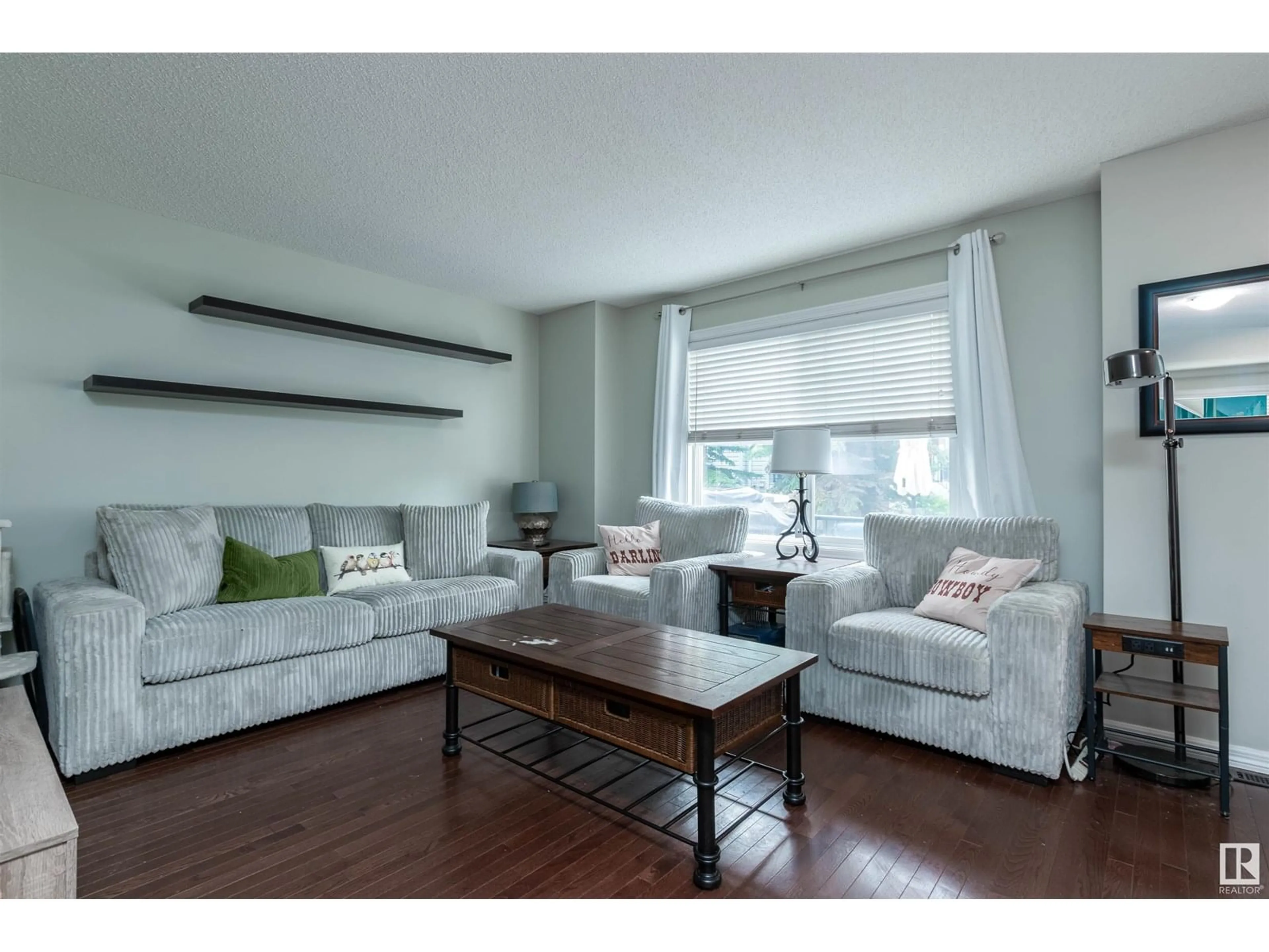 Living room with furniture, wood/laminate floor for 30 - 2336 ASPEN TR, Sherwood Park Alberta T8H0J1