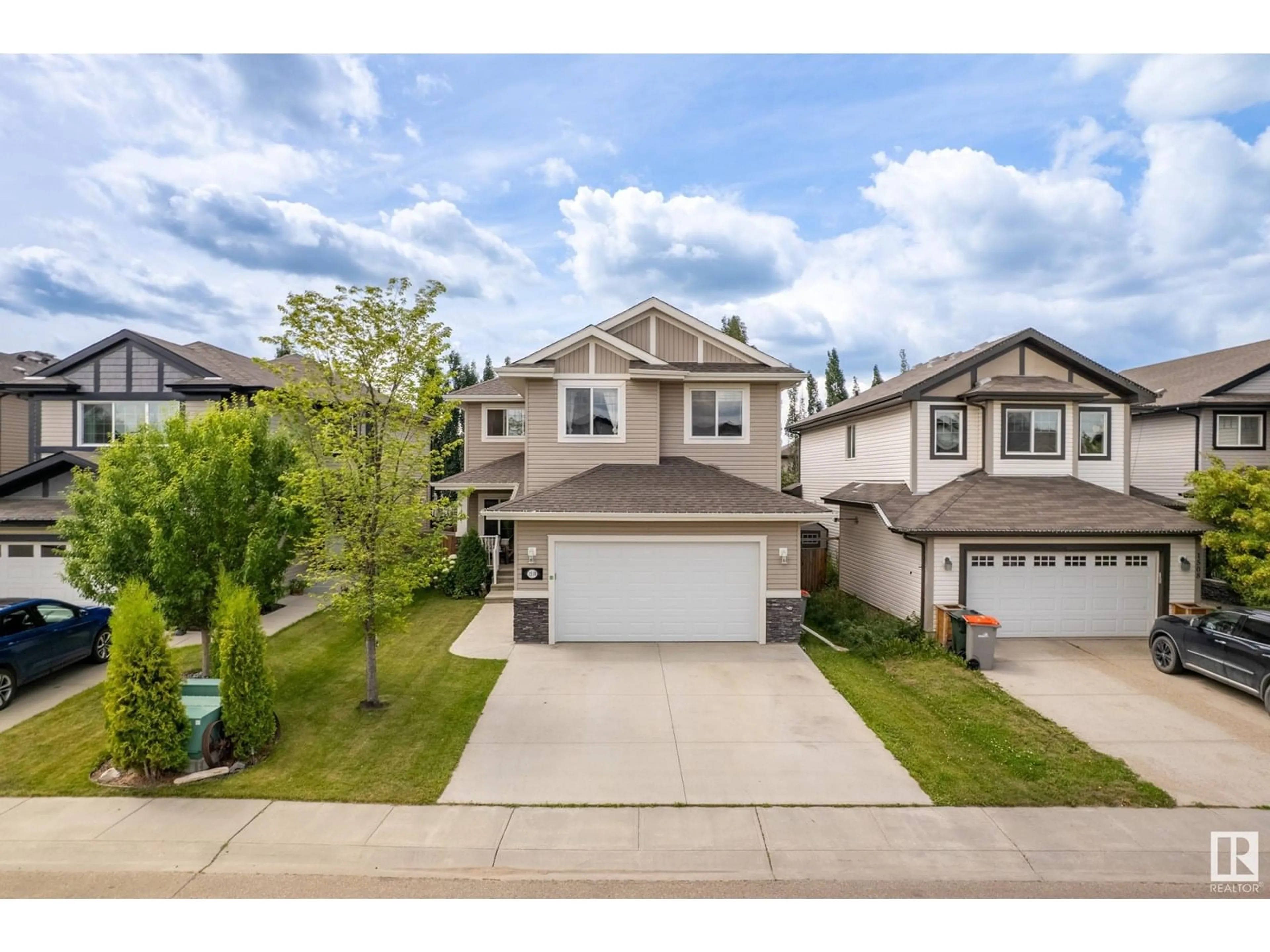A pic from outside/outdoor area/front of a property/back of a property/a pic from drone, street for 1510 WESTERRA BN, Stony Plain Alberta T7Z0B3