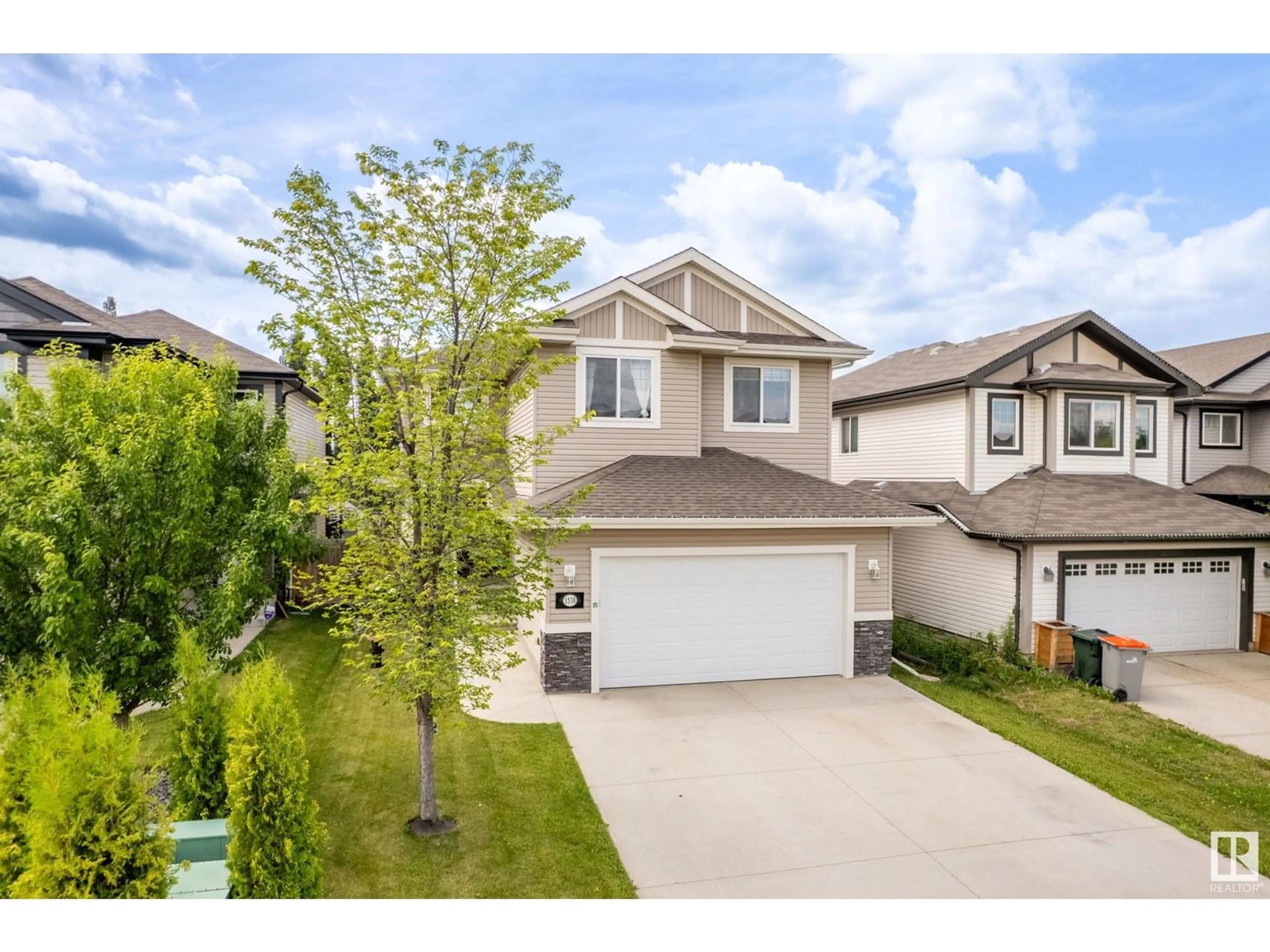 A pic from outside/outdoor area/front of a property/back of a property/a pic from drone, street for 1510 WESTERRA BN, Stony Plain Alberta T7Z0B3