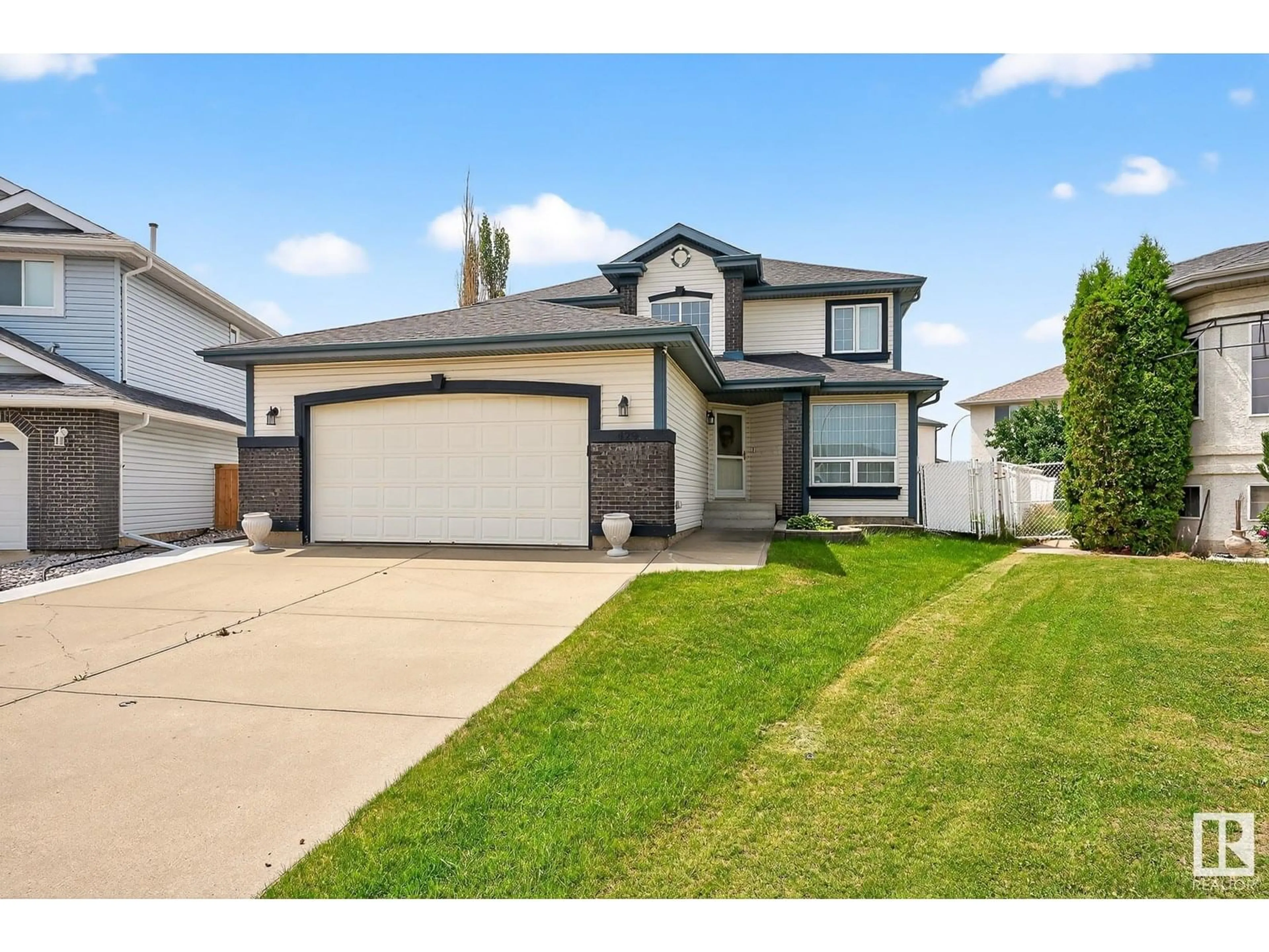 Home with vinyl exterior material, street for 429 KLARVATTEN LAKE WD, Edmonton Alberta T5Z3B9