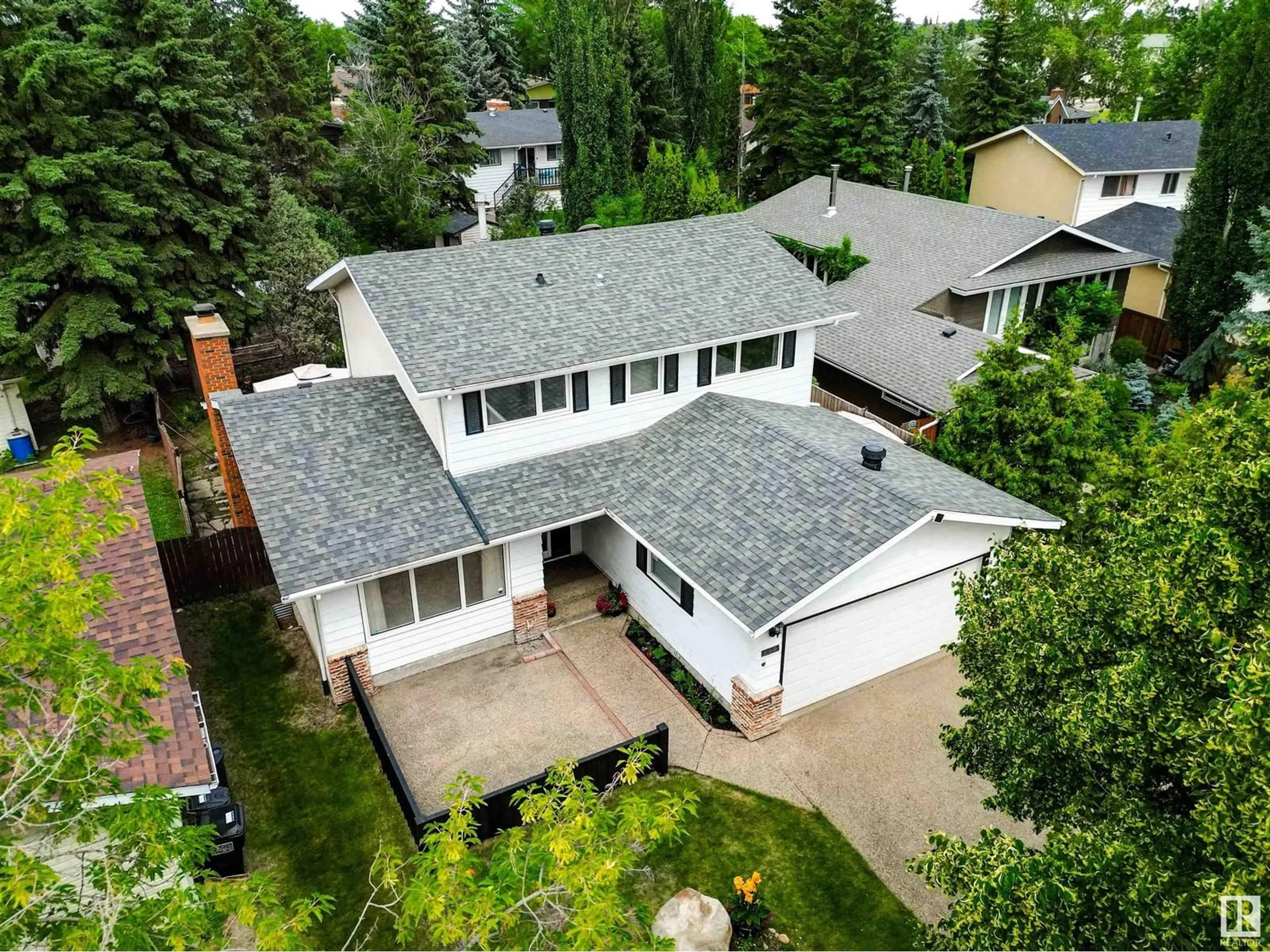 A pic from outside/outdoor area/front of a property/back of a property/a pic from drone, street for 1725 68 ST, Edmonton Alberta T6K2H9