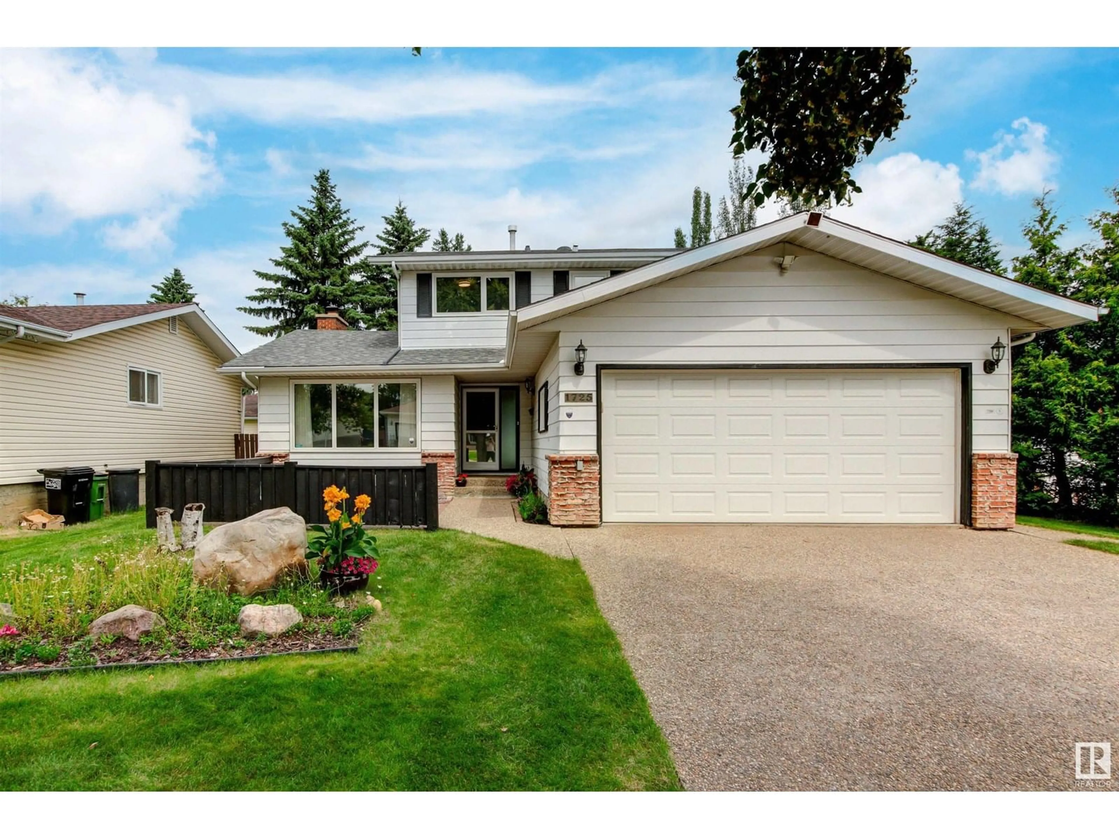 Home with vinyl exterior material, street for 1725 68 ST, Edmonton Alberta T6K2H9