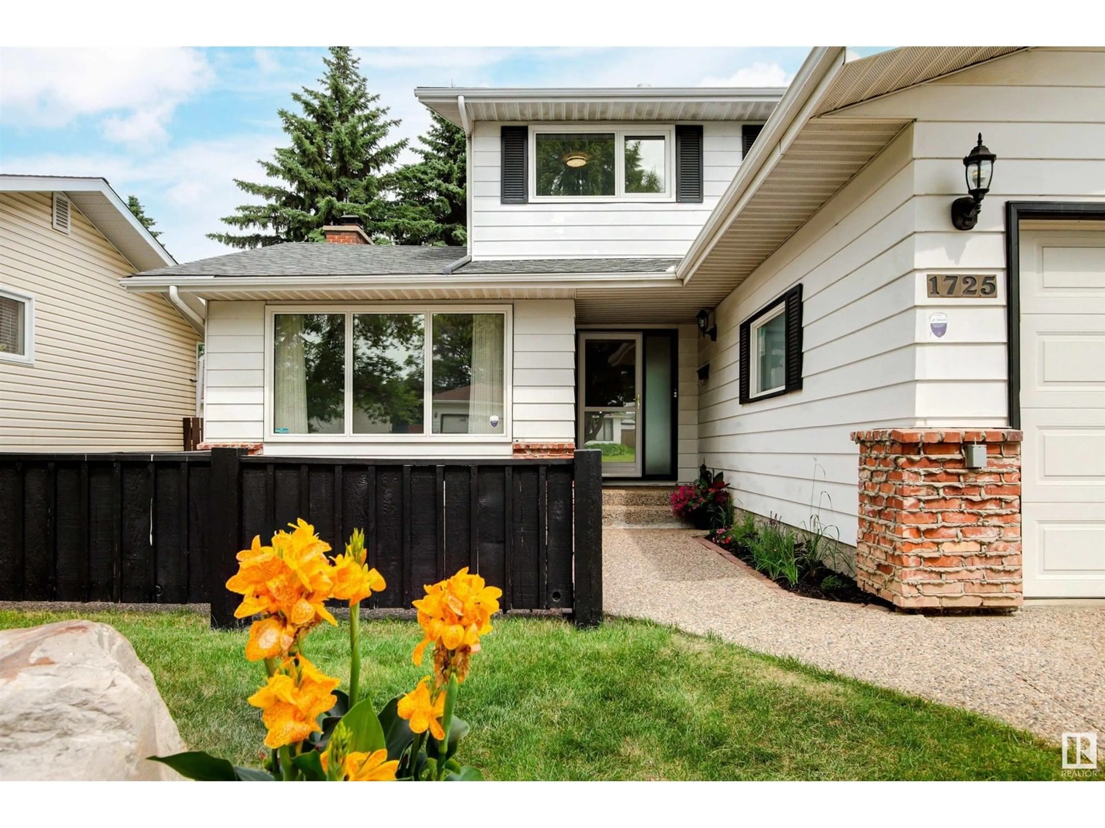 Home with vinyl exterior material, street for 1725 68 ST, Edmonton Alberta T6K2H9
