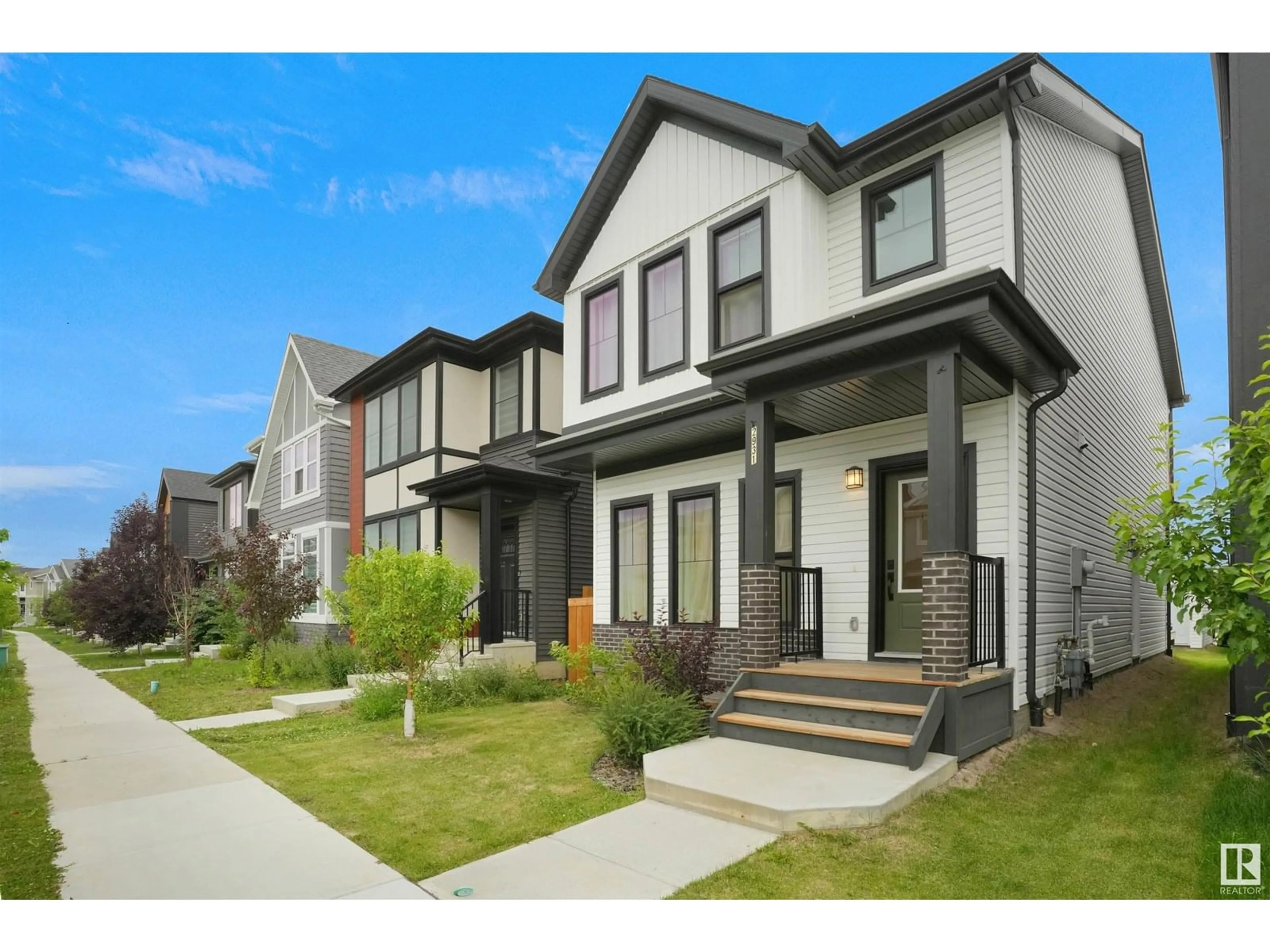 Home with brick exterior material, street for GR SW - 2931 COUGHLAN GREEN, Edmonton Alberta T6W3X6