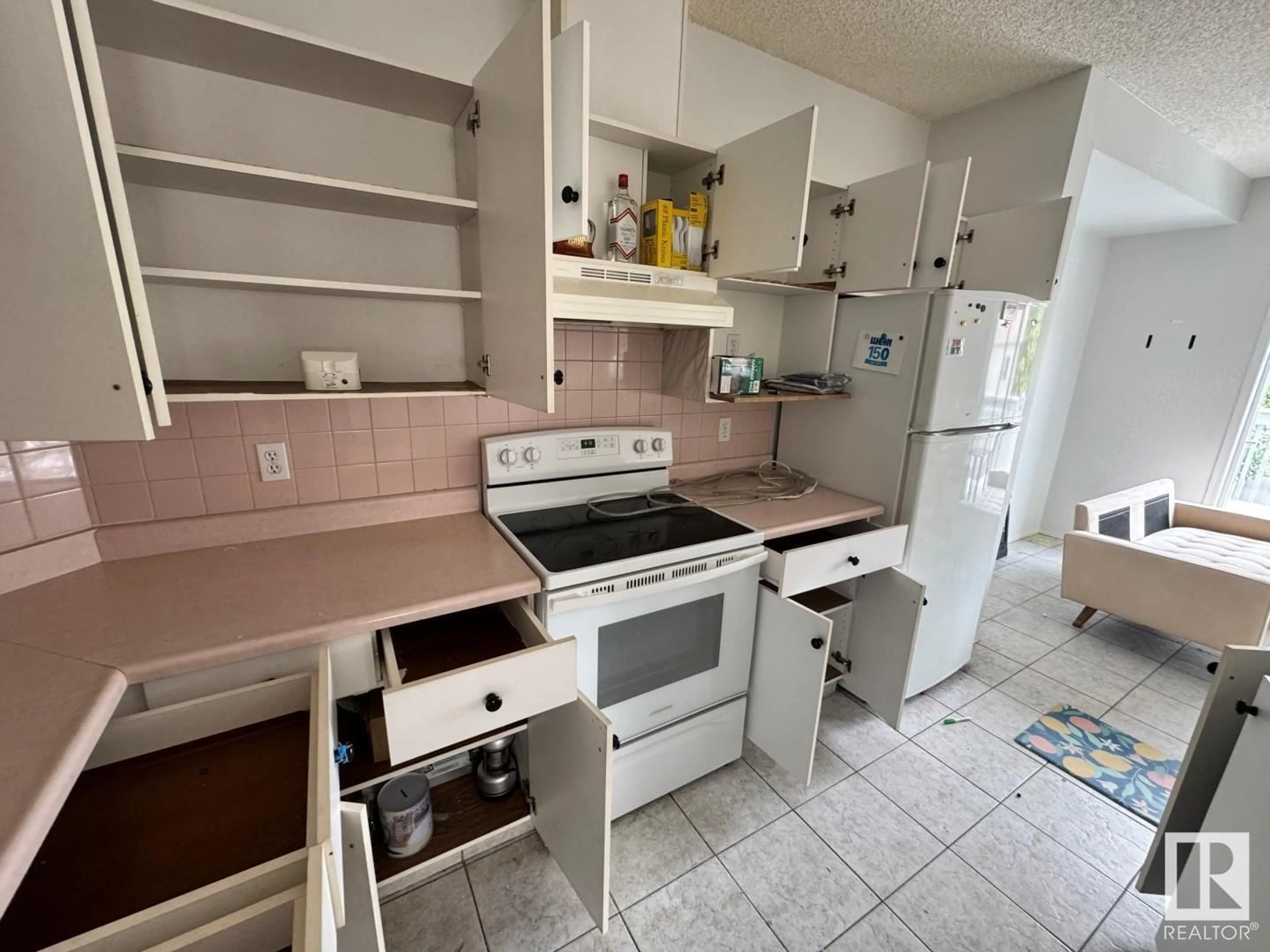Standard kitchen, ceramic/tile floor for 843 - 49 YOUVILLE W, Edmonton Alberta T6L6X8