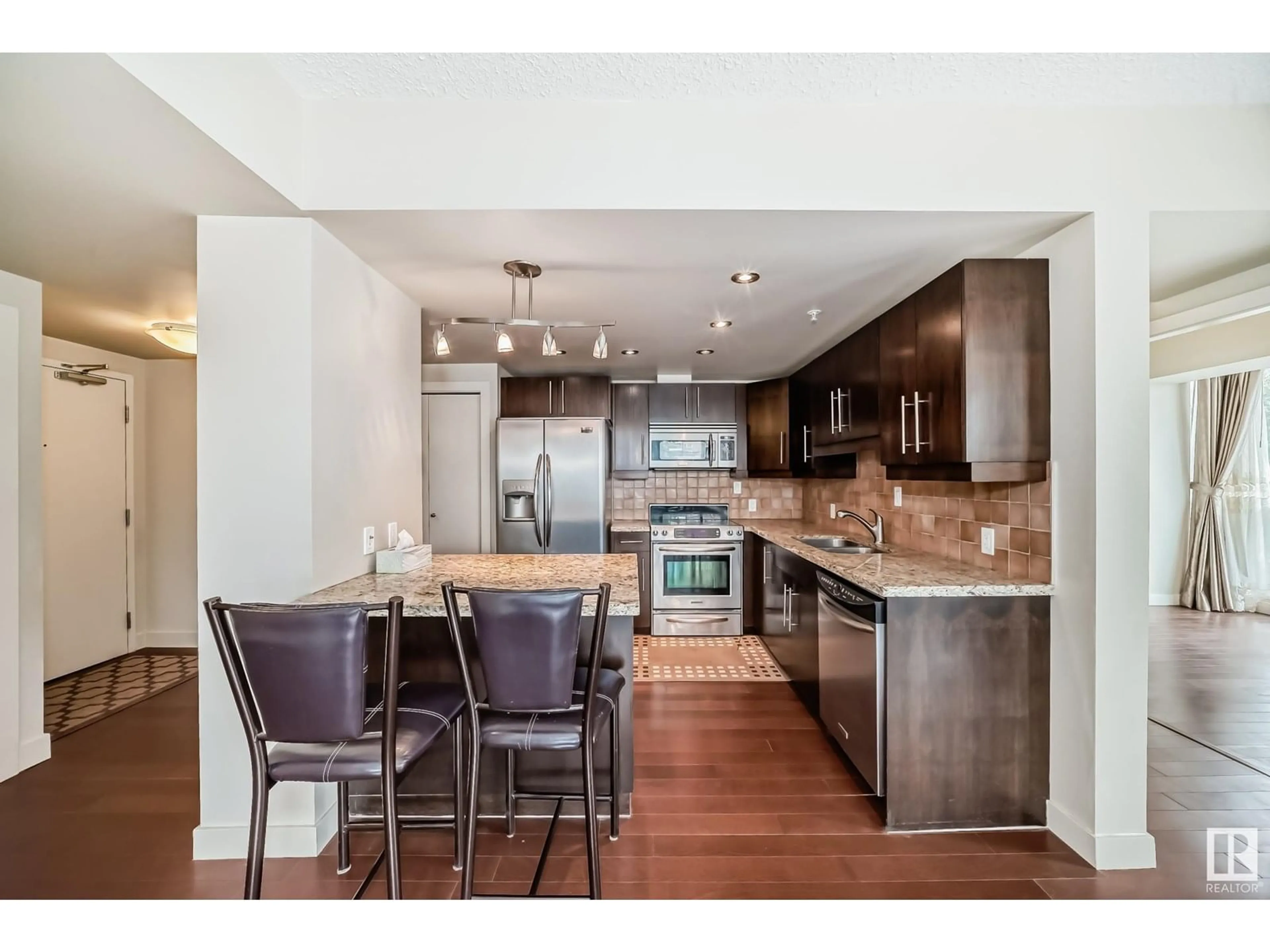 Open concept kitchen, unknown for #203 - 10046 117 ST, Edmonton Alberta T5K1X2