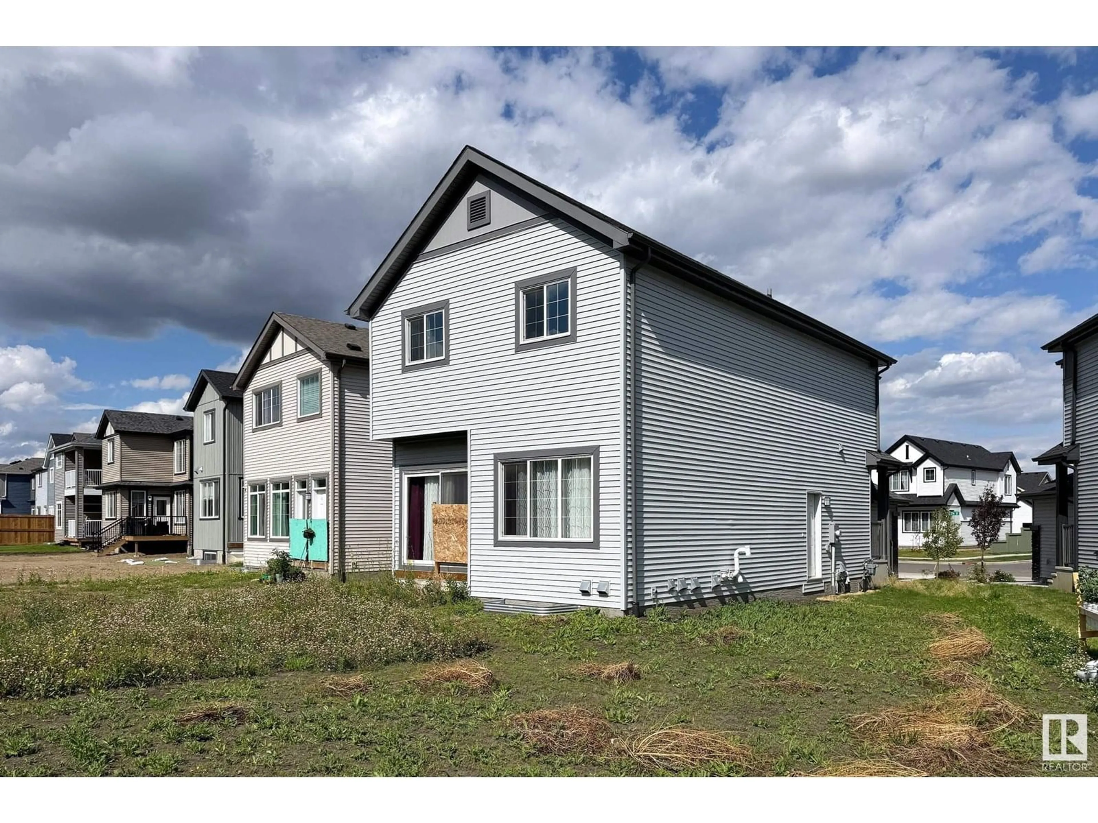 Home with vinyl exterior material, street for NW - 3608 214 ST, Edmonton Alberta T6M1S3
