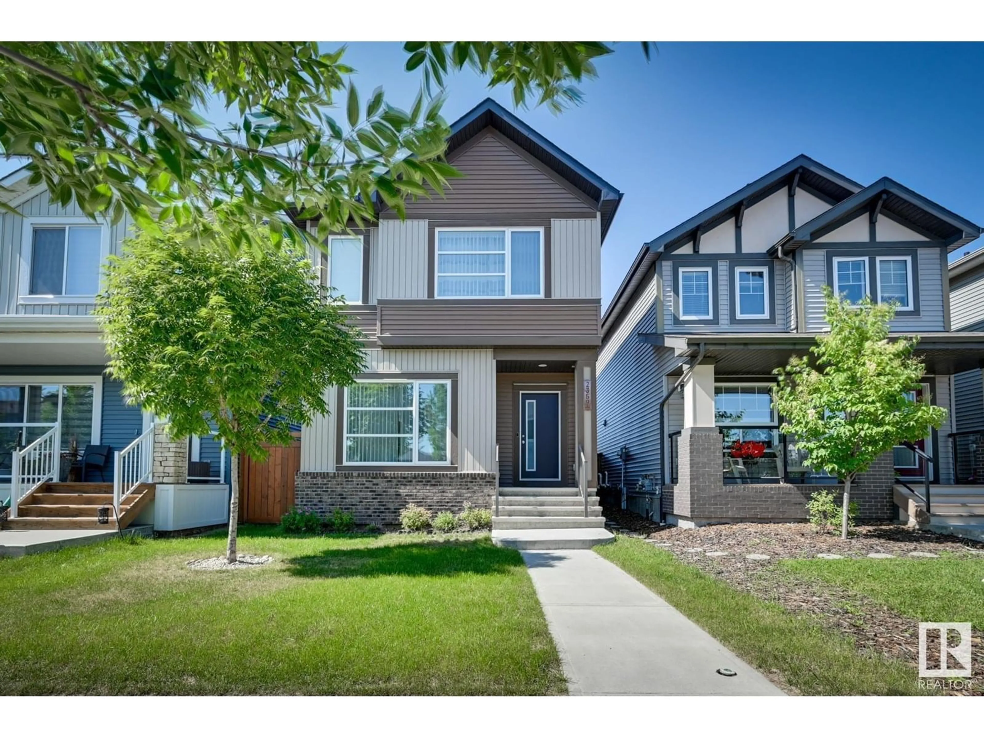 Home with vinyl exterior material, street for 2359 CASEY CR, Edmonton Alberta T6W3N1