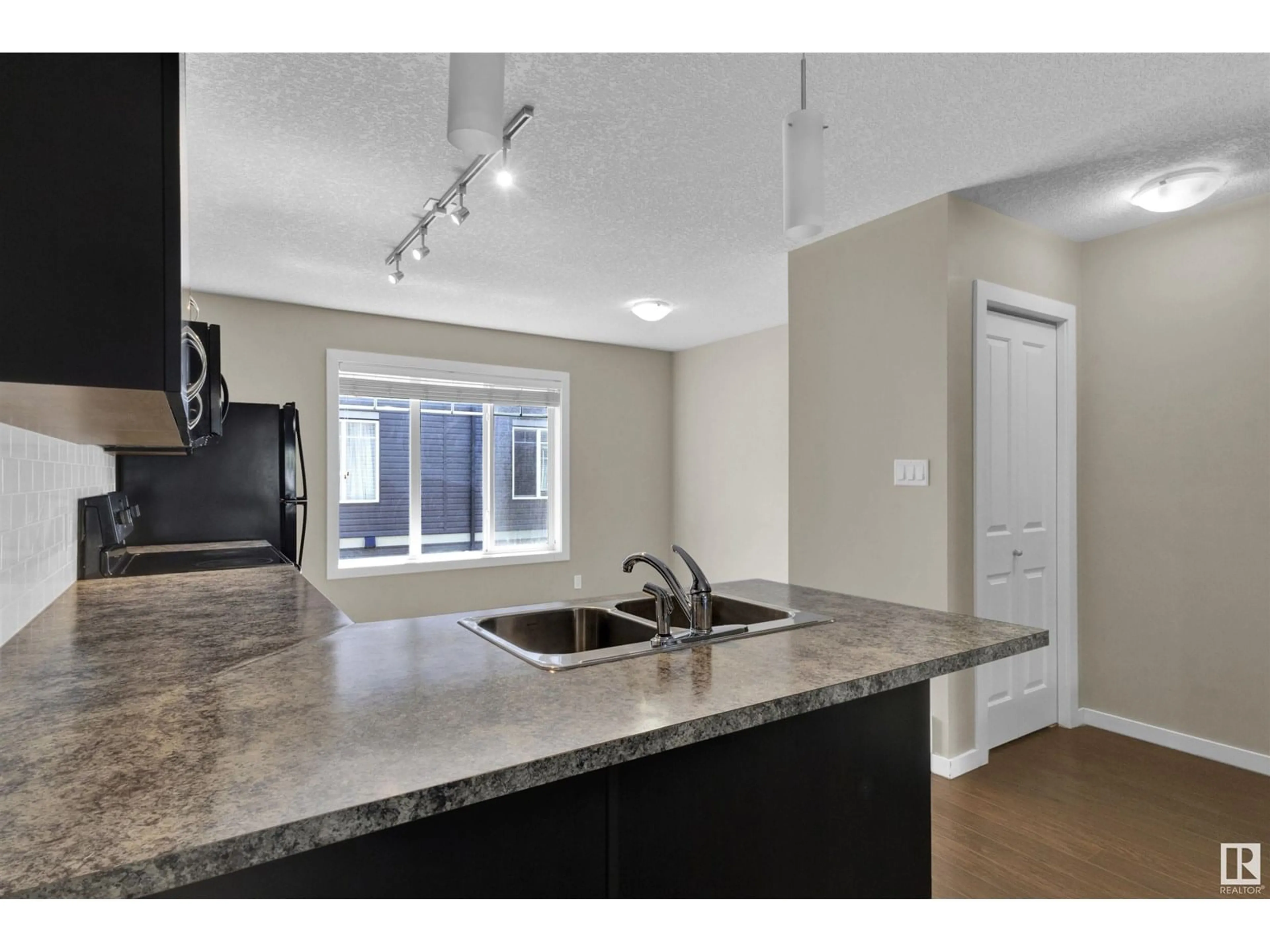 Open concept kitchen, unknown for 50 9515 160 AV, Edmonton Alberta T5Z0M4