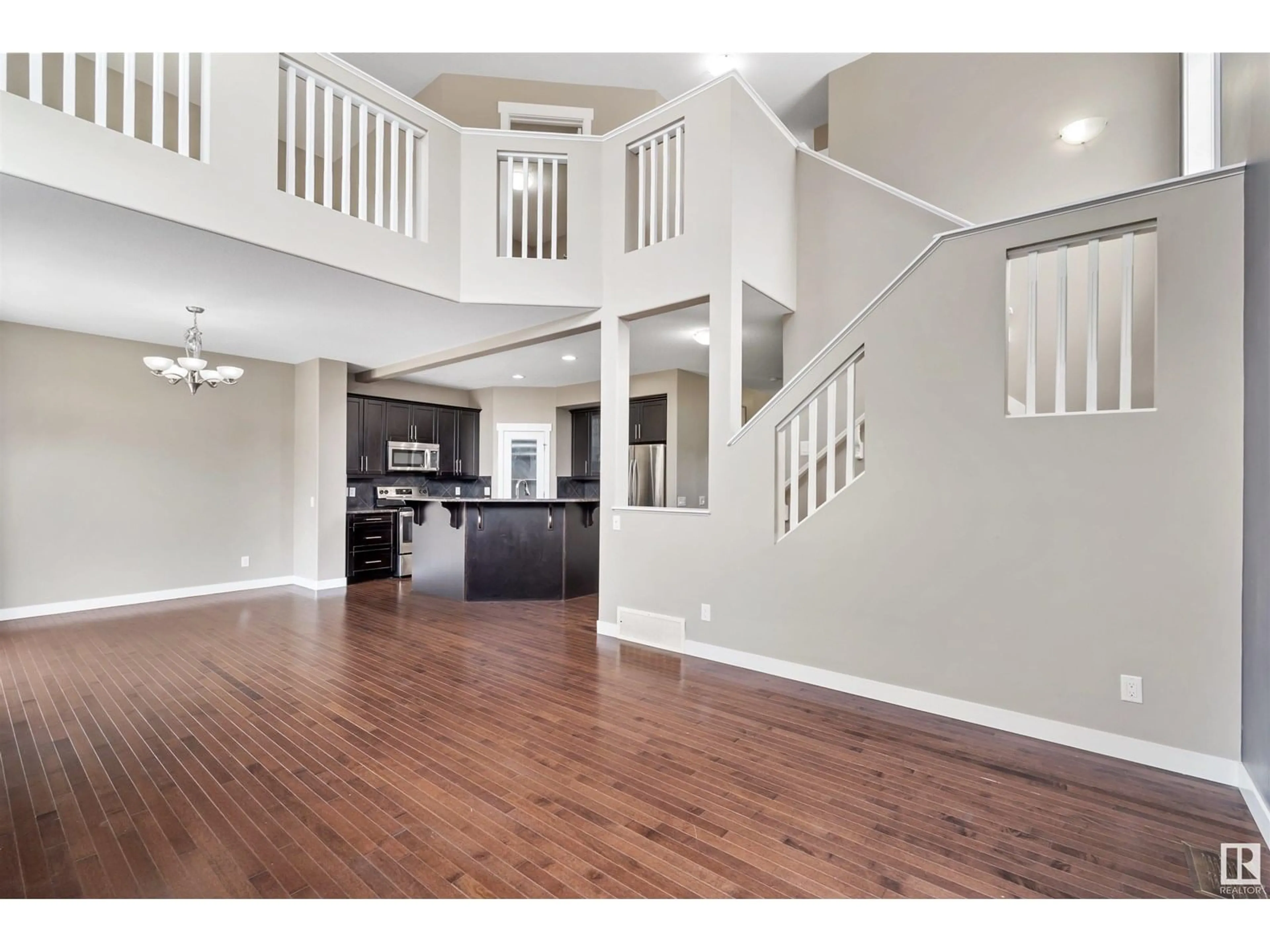 Open concept kitchen, wood/laminate floor for SW - 988 175 ST, Edmonton Alberta T6W1Z8